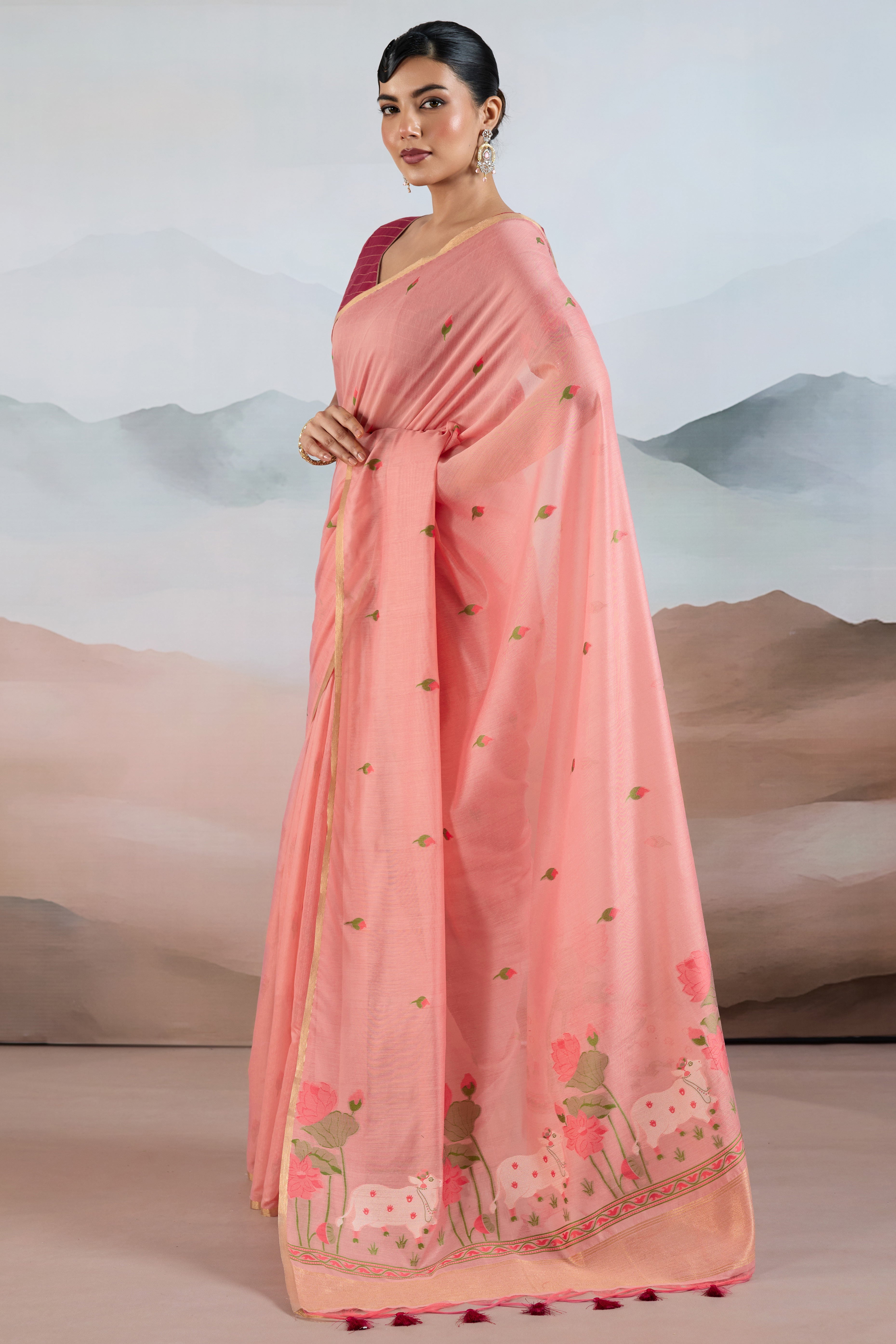 Trendy Peach Cotton Blend Weaving Saree Showcasing Floral & Animal Motif & Classic Tassel Pallu