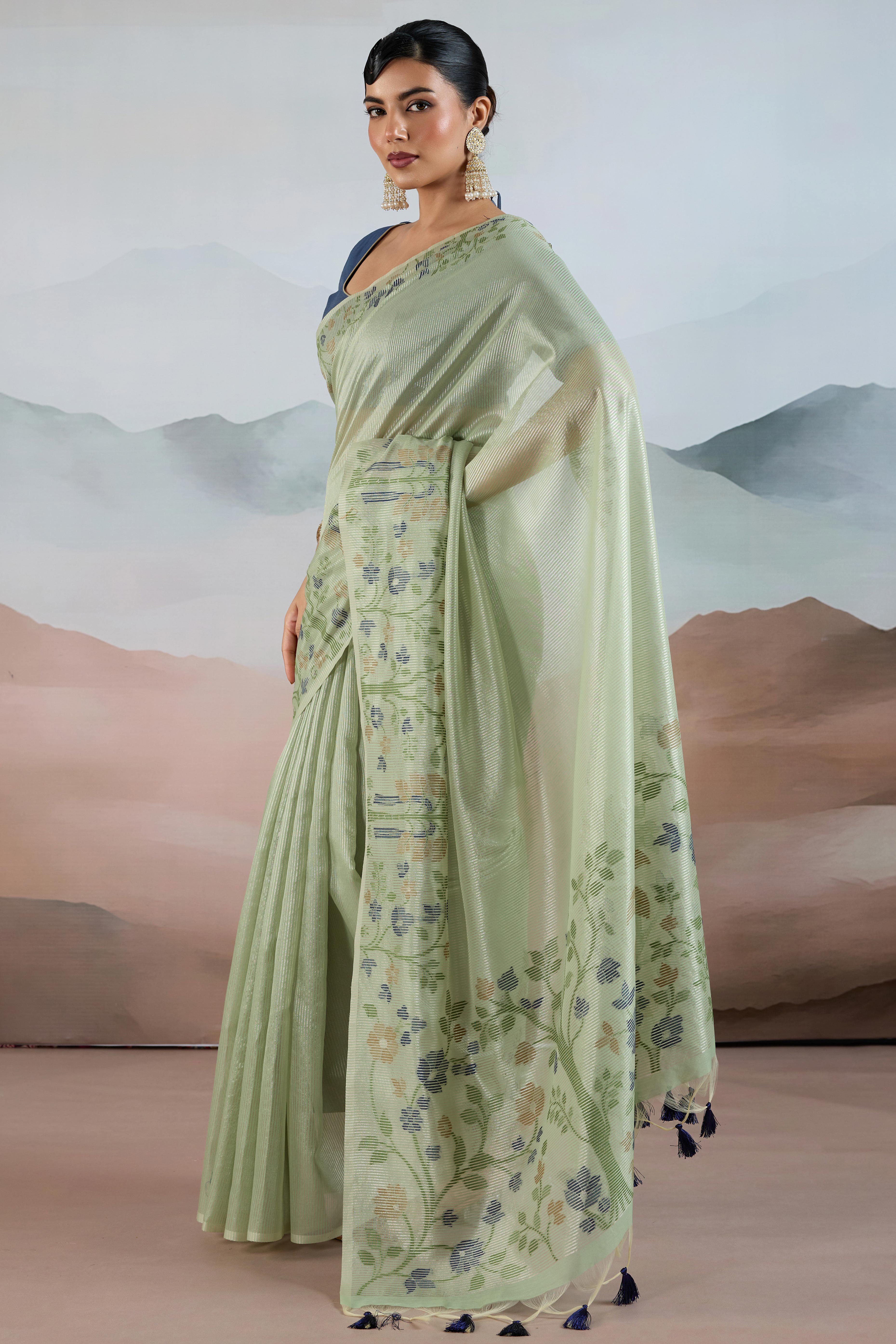 Green Tissue Silk Saree Showcasing Floral & Striped Weaving With Tassel Adornment