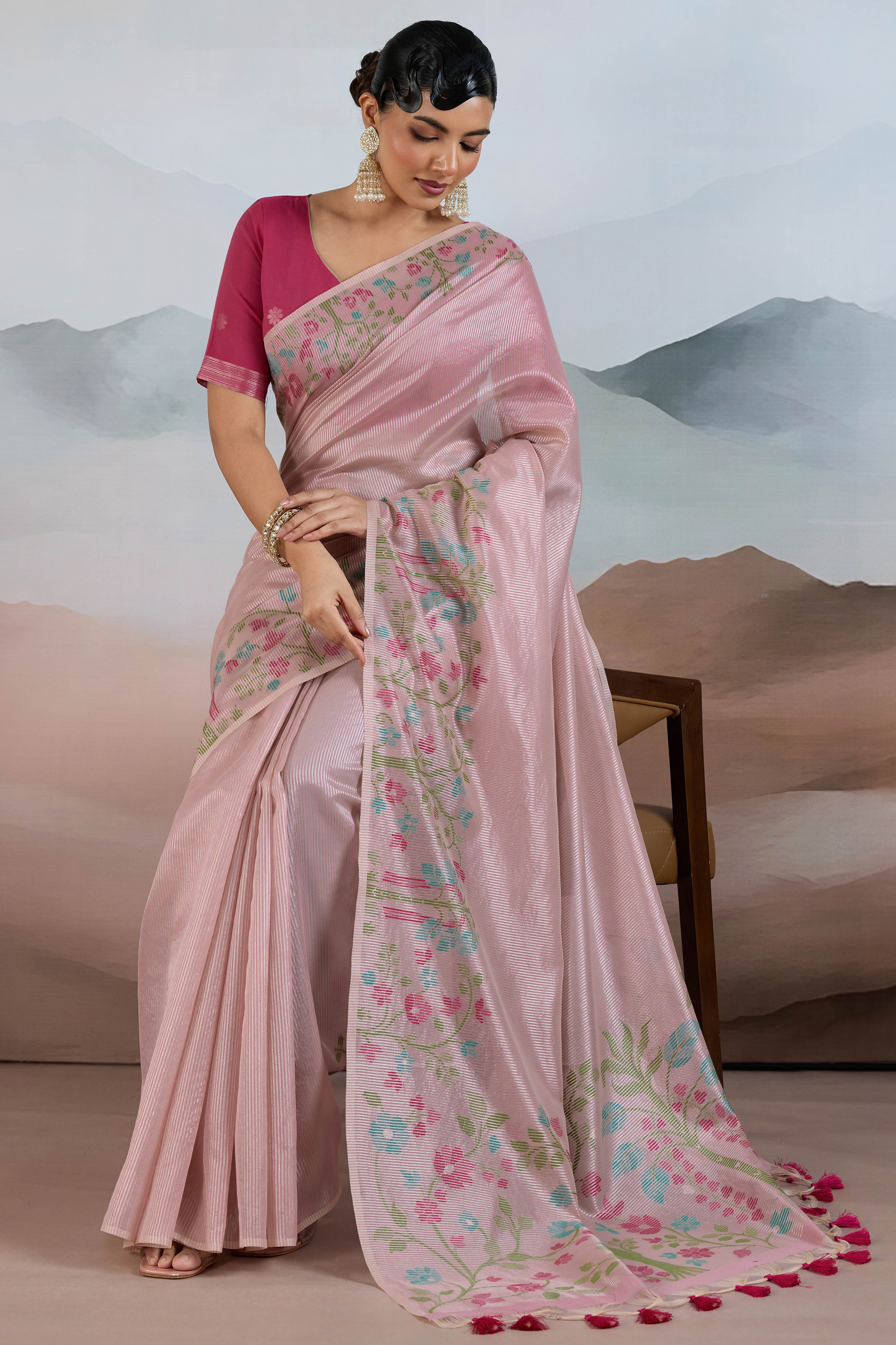 Pink Tissue Silk Saree Showcasing Floral & Striped Weaving With Tassel Adornment