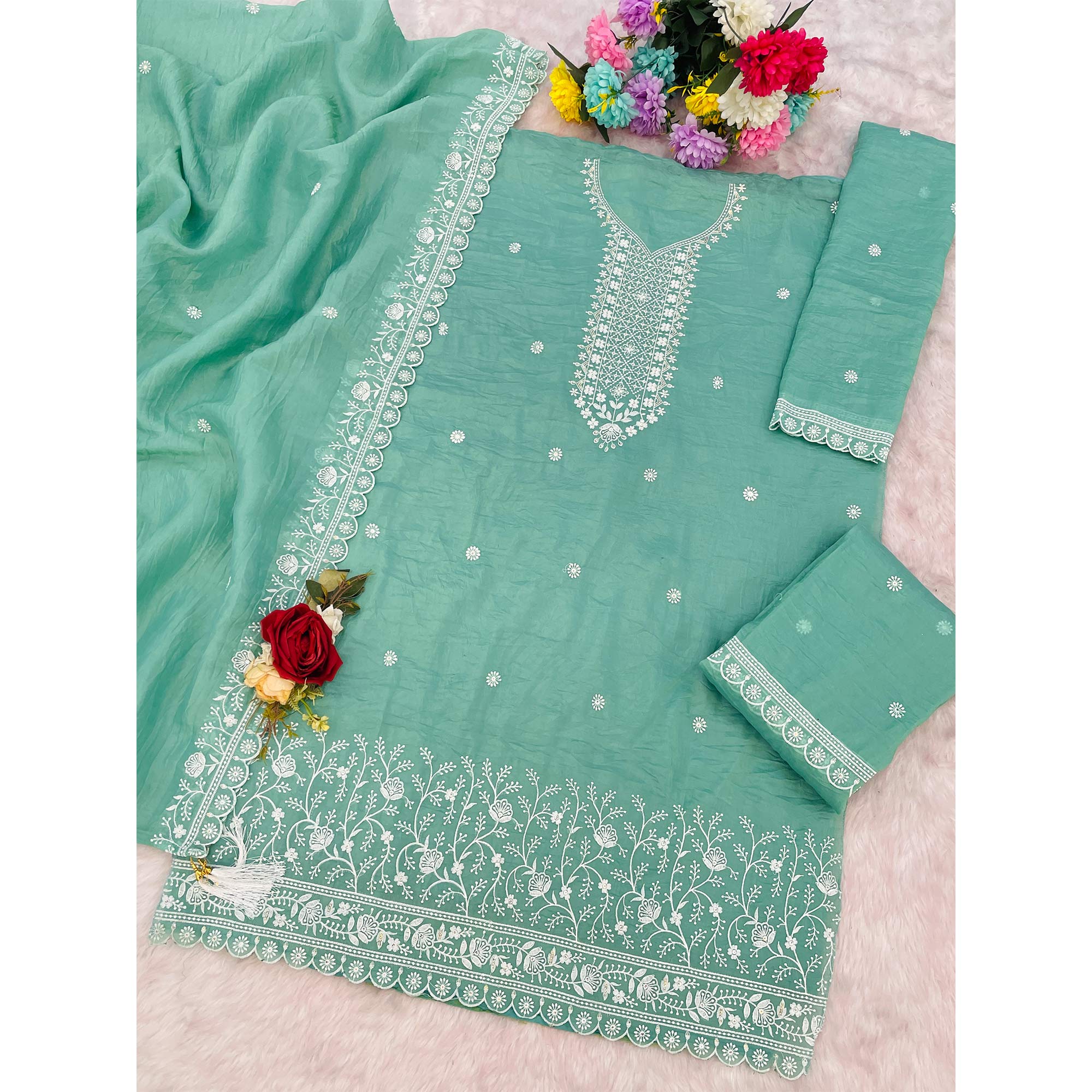 Turquoise Elegant Embroidered Georgette Semi-Stitched Salwar Suit with Stylish Palazzo Bottoms