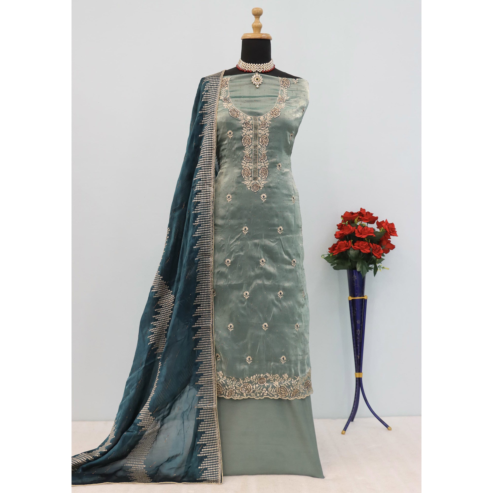 Turquoise Floral Embroidery With Swarovski Work Jimmy Choo Tissue Semi Stitched Suit