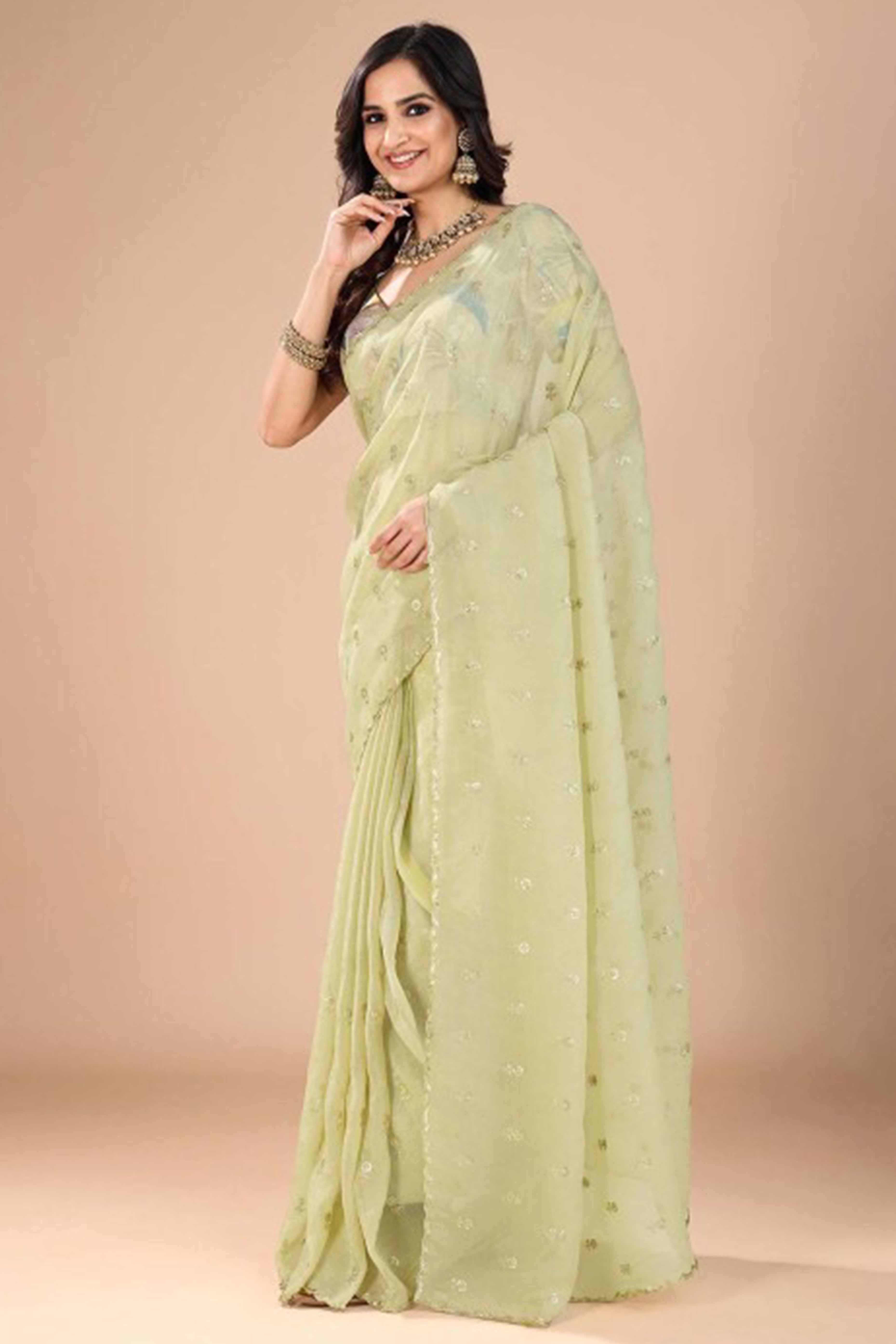 Green Crunchy Saree Adorned With Floral Sequins Embroidery & Graceful Border Finish
