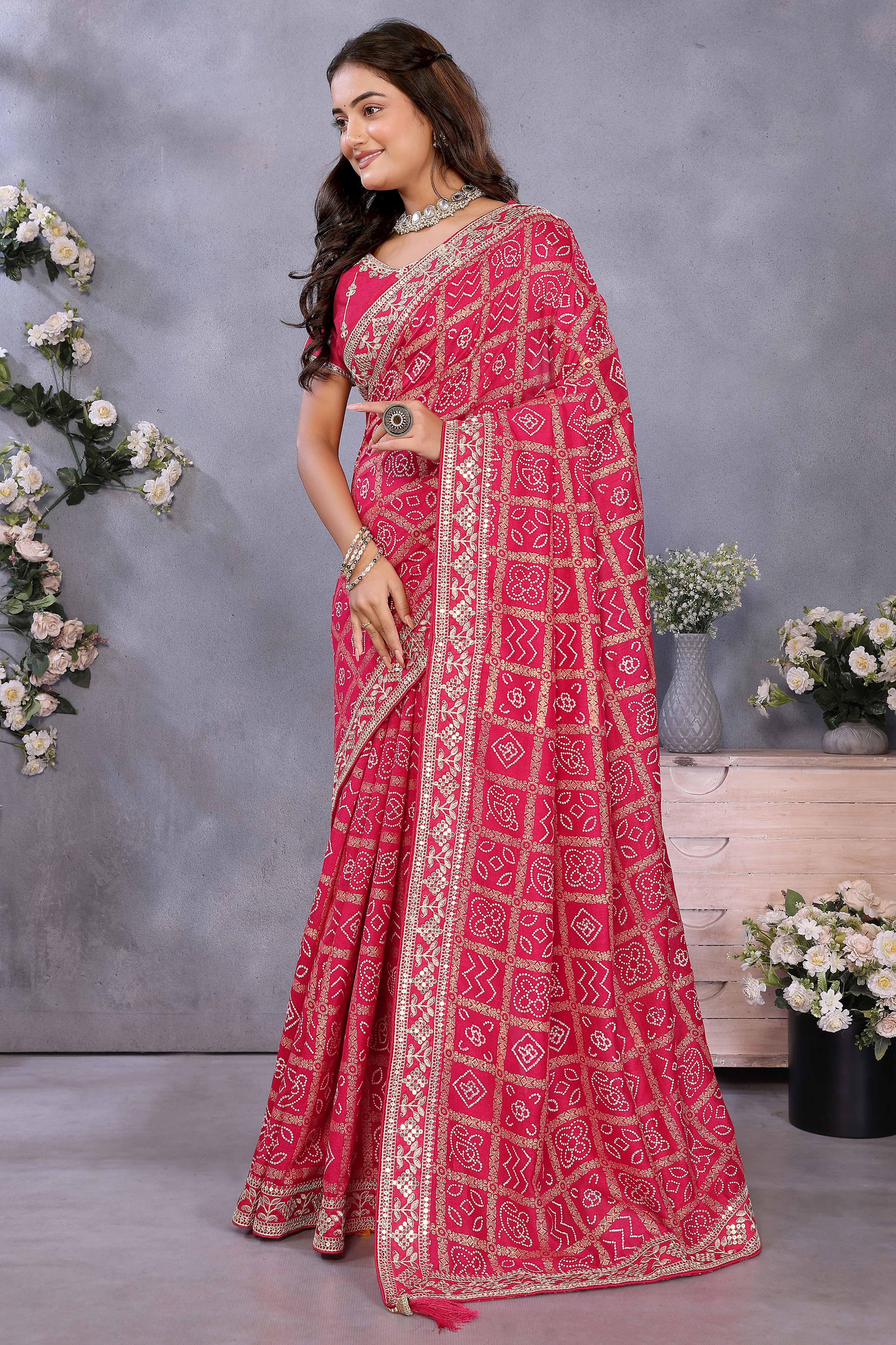Pink Vichitra Silk Saree Highlighted with Bandhani Print and Sequins Embroidered Border