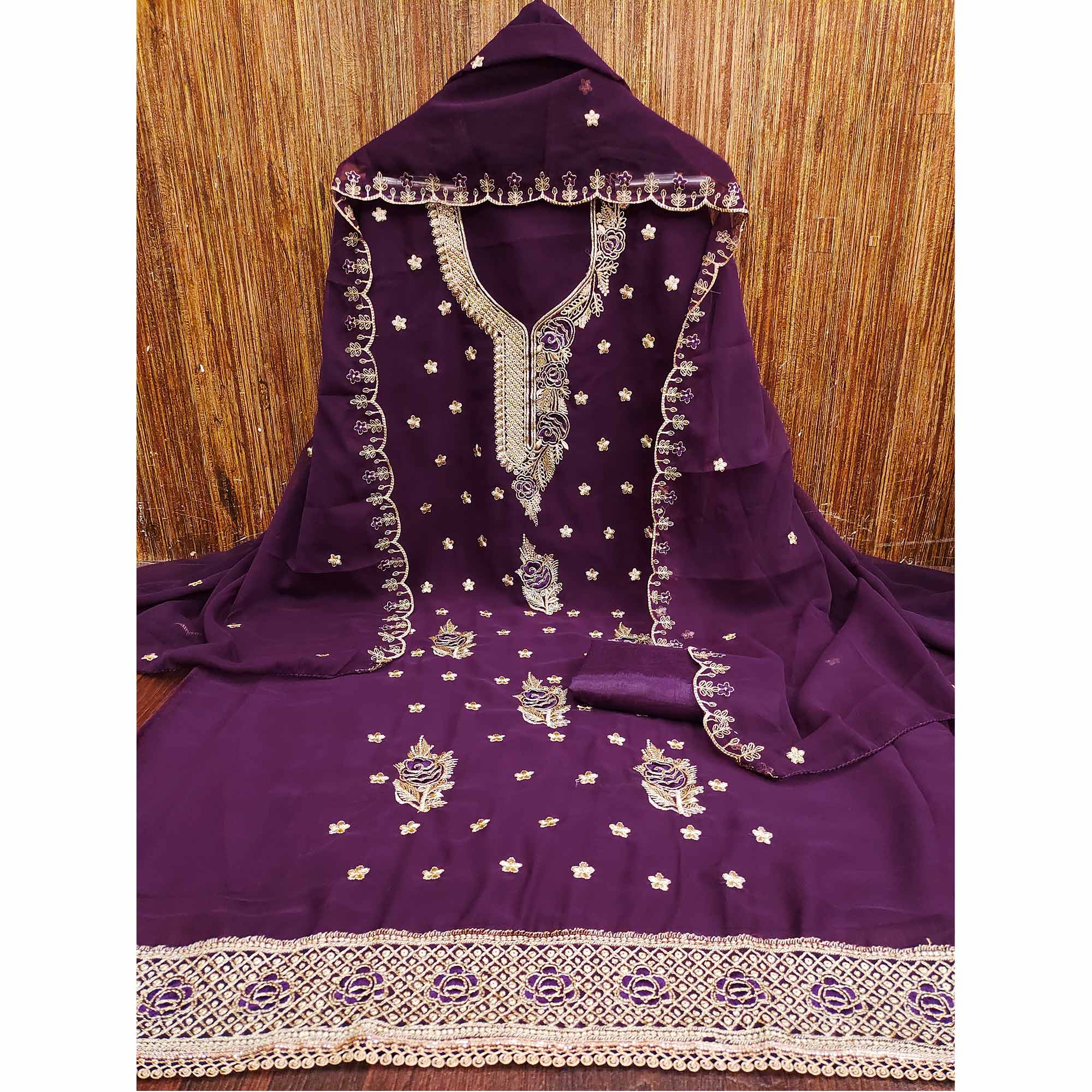 Wine Dress Material Featuring Delicate Floral Thread & Zari Embroidery Work On Georgette