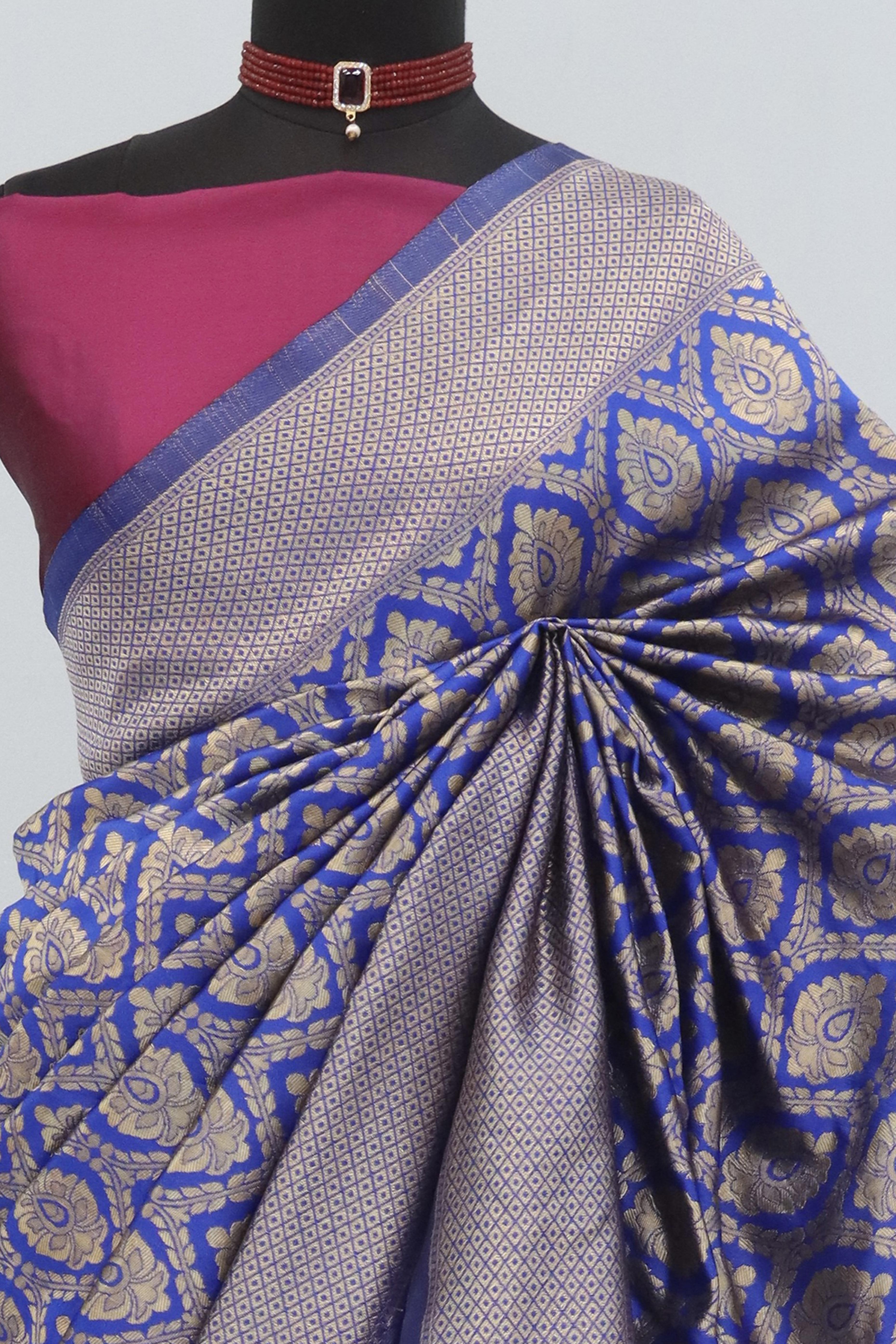 Charming Royal Blue & Pink Banarasi Silk Saree Adorned With Floral Zari Weaving