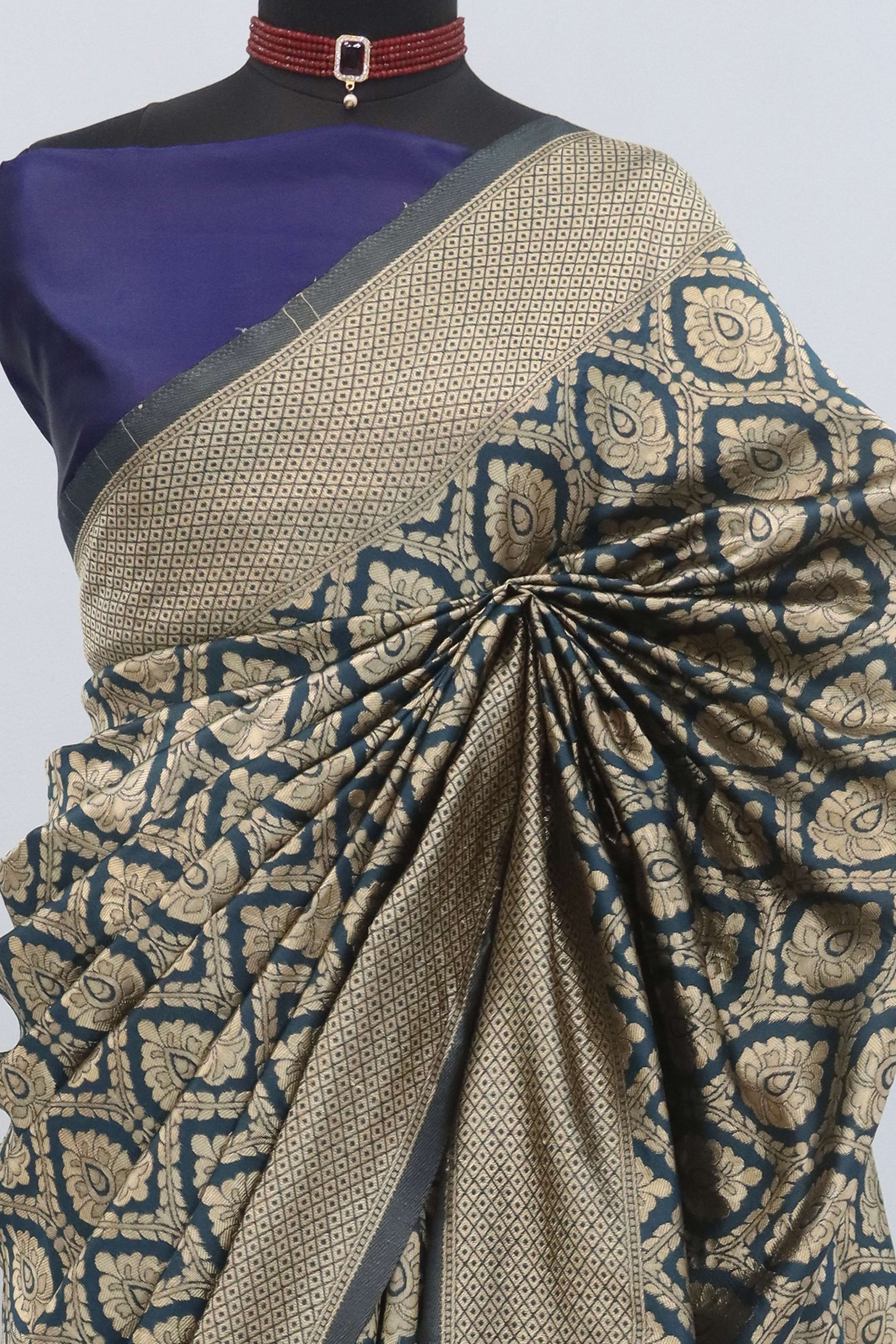 Charming Dark Teal Banarasi Silk Saree Adorned With Floral Zari Weaving