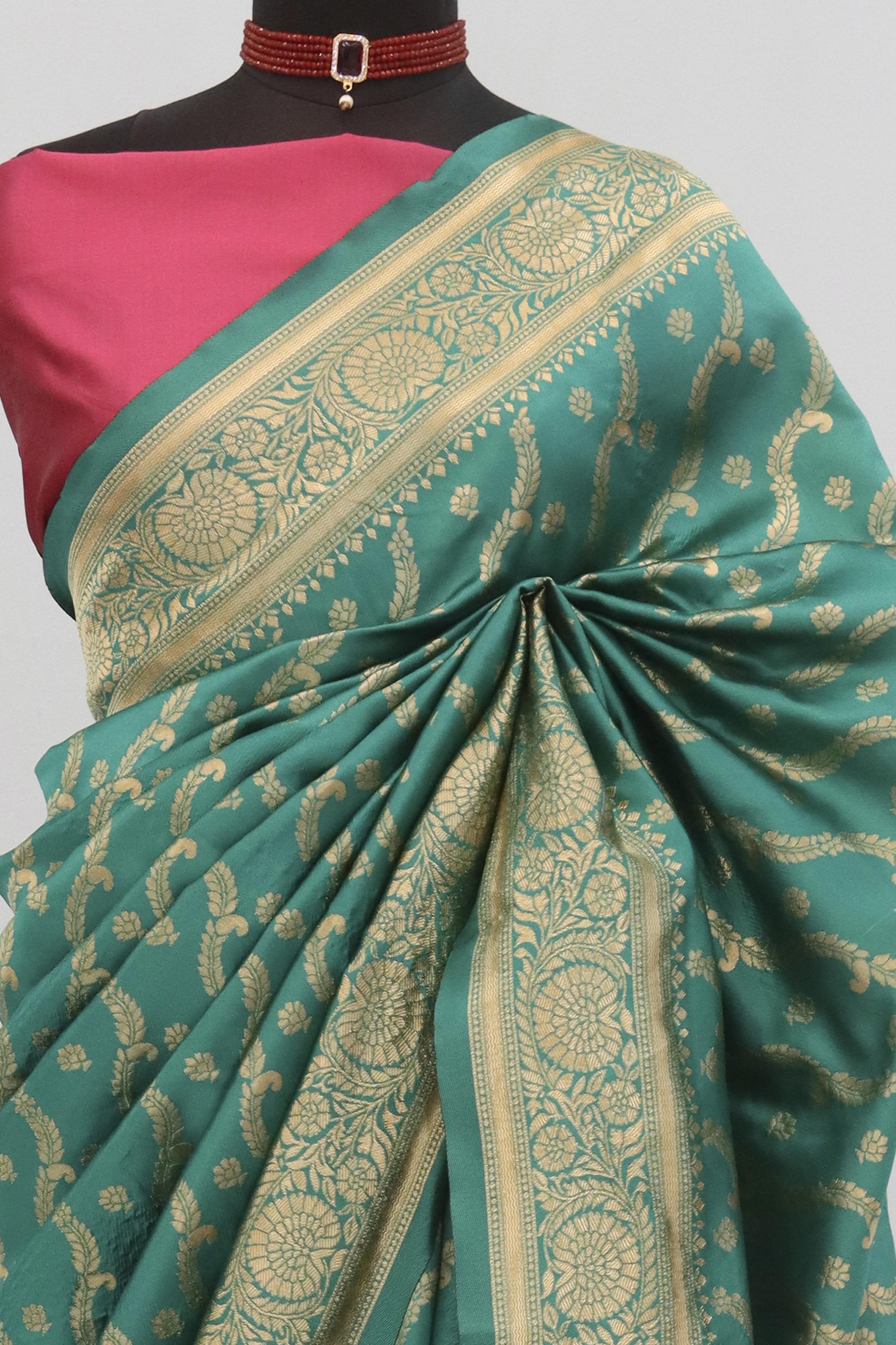 Graceful Rama Blue Banarasi Silk Saree Featuring Intricate Floral Zari Weaving Work