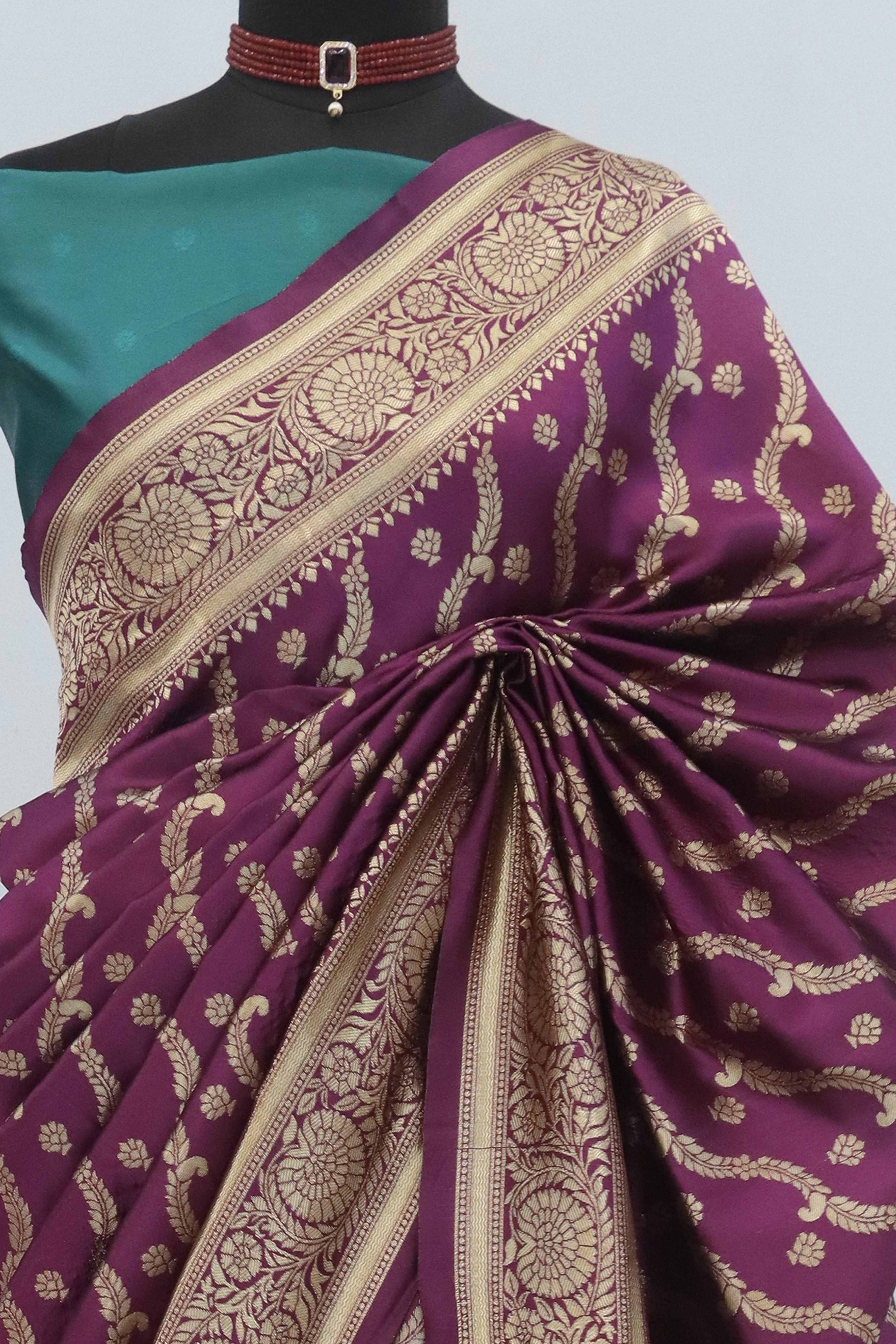 Graceful Wine Banarasi Silk Saree Featuring Intricate Floral Zari Weaving Work