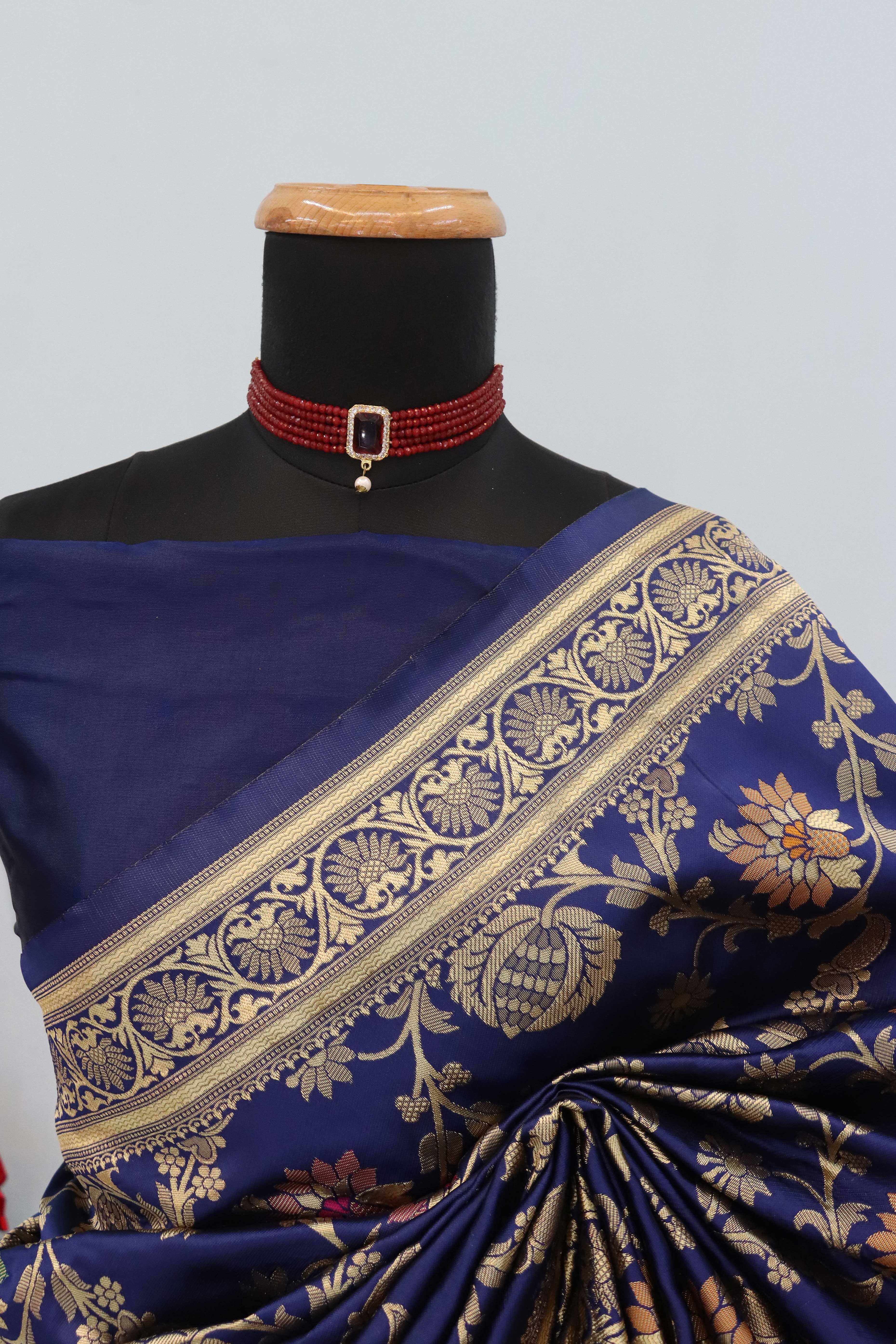 Charming Navy Blue Banarasi Silk Saree Adorned With Floral Zari Weaving