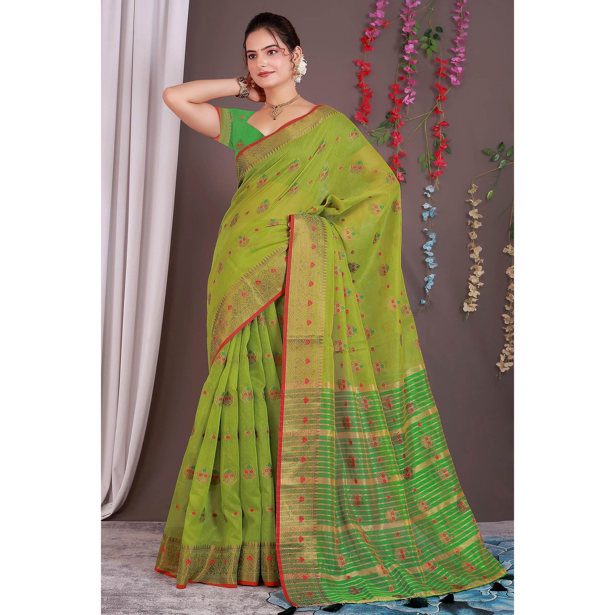 Green Floral Woven Cotton Silk Saree With Tassels