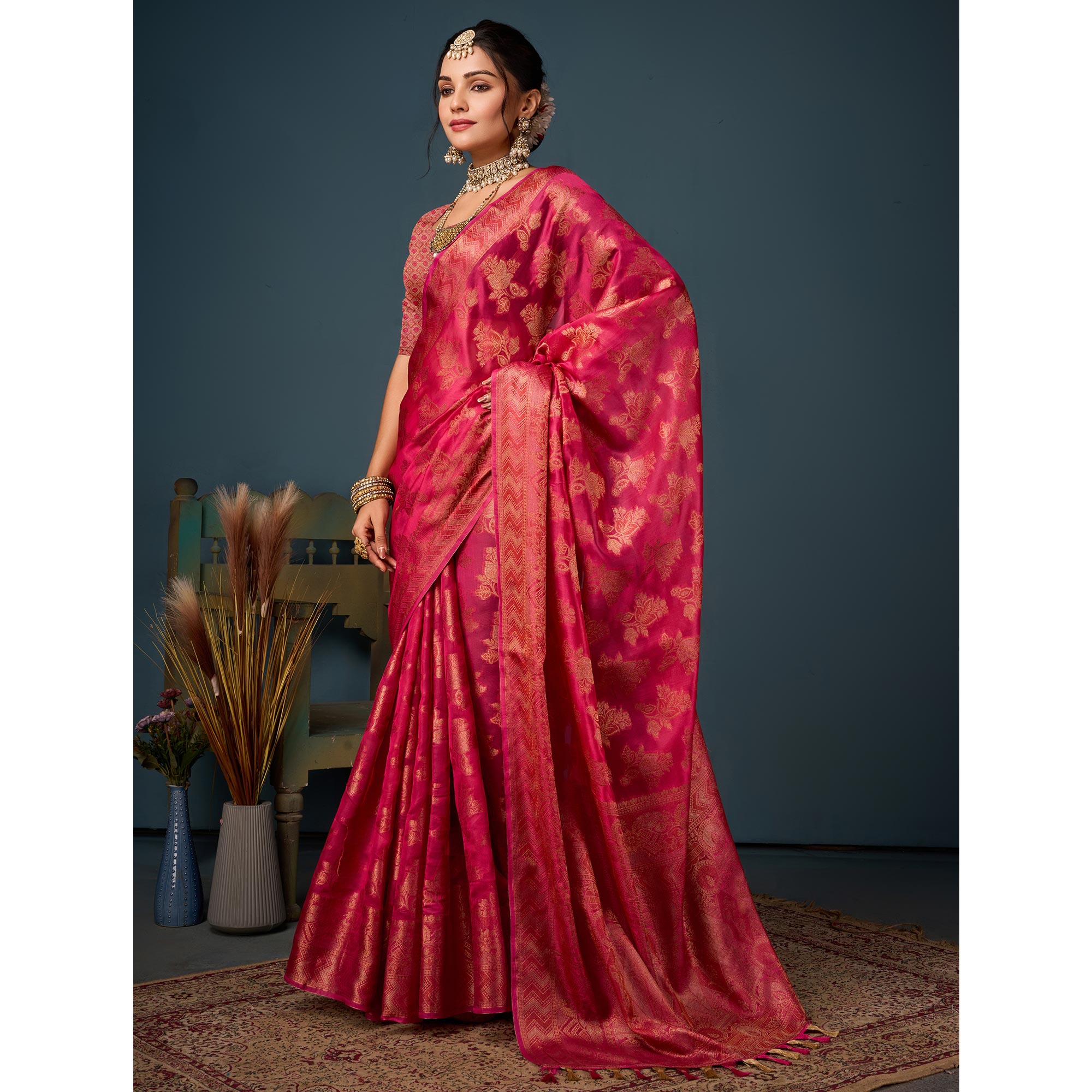 Rani Pink Floral Woven Organza Saree With Tassels