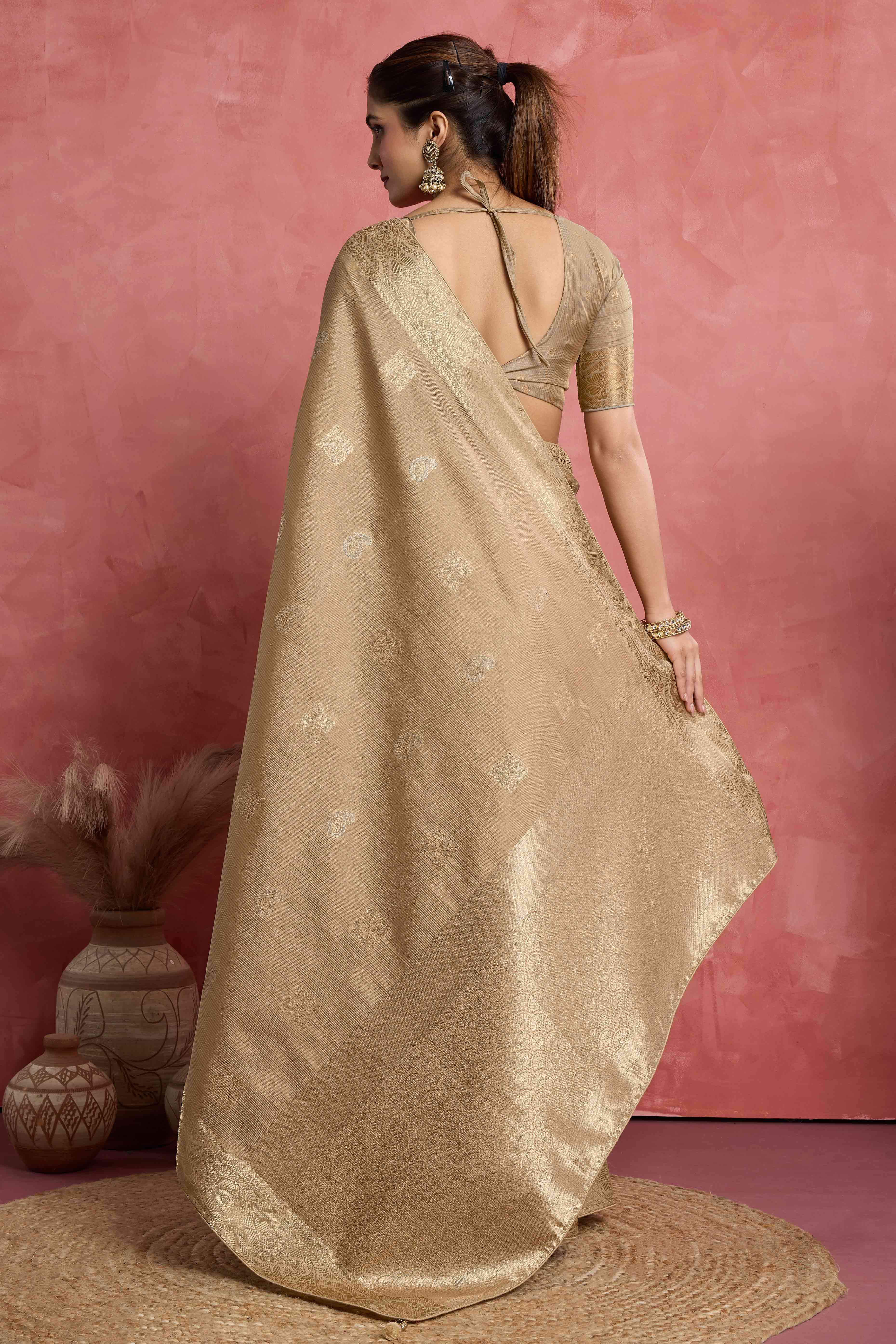 Contemporary Beige Silk Blend Saree Flaunting Alternate Butta With Piping & Tassel Accents