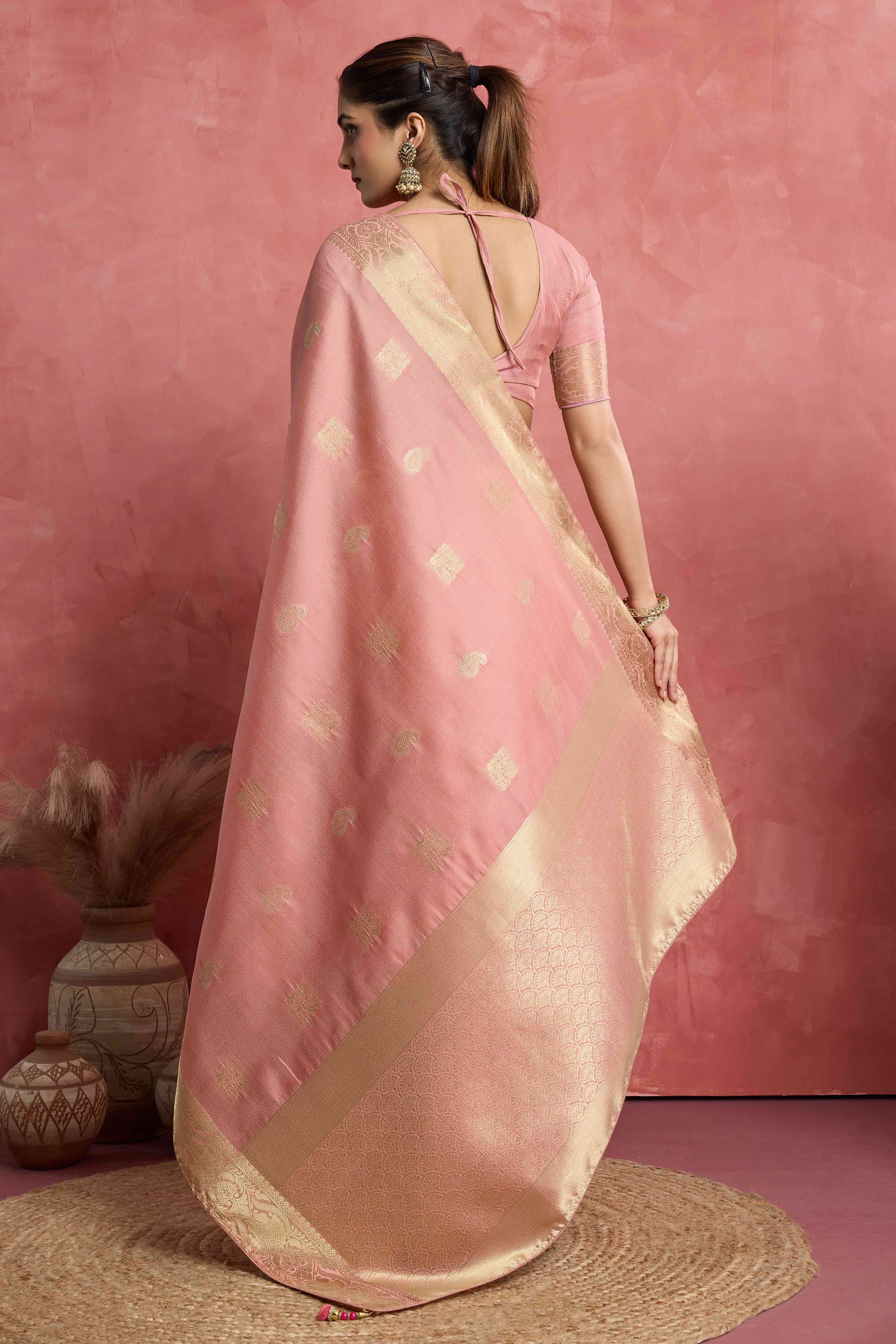 Contemporary Gajari Pink Silk Blend Saree Flaunting Alternate Buttas With Piping & Tassel Accents