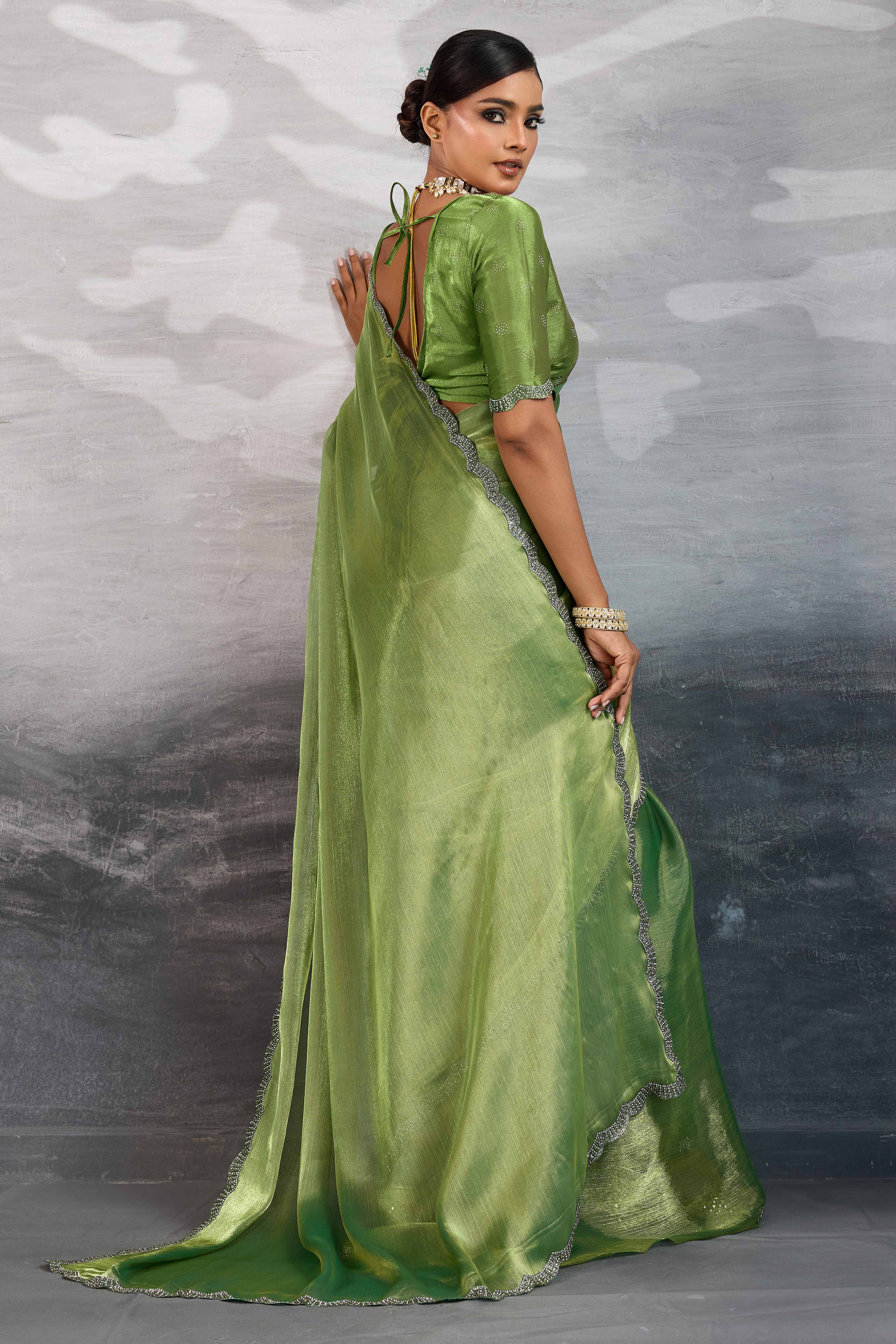 Green Burberry Chiffon Saree Embellished With Zarkan & Cutdana Appliqué Lace Border