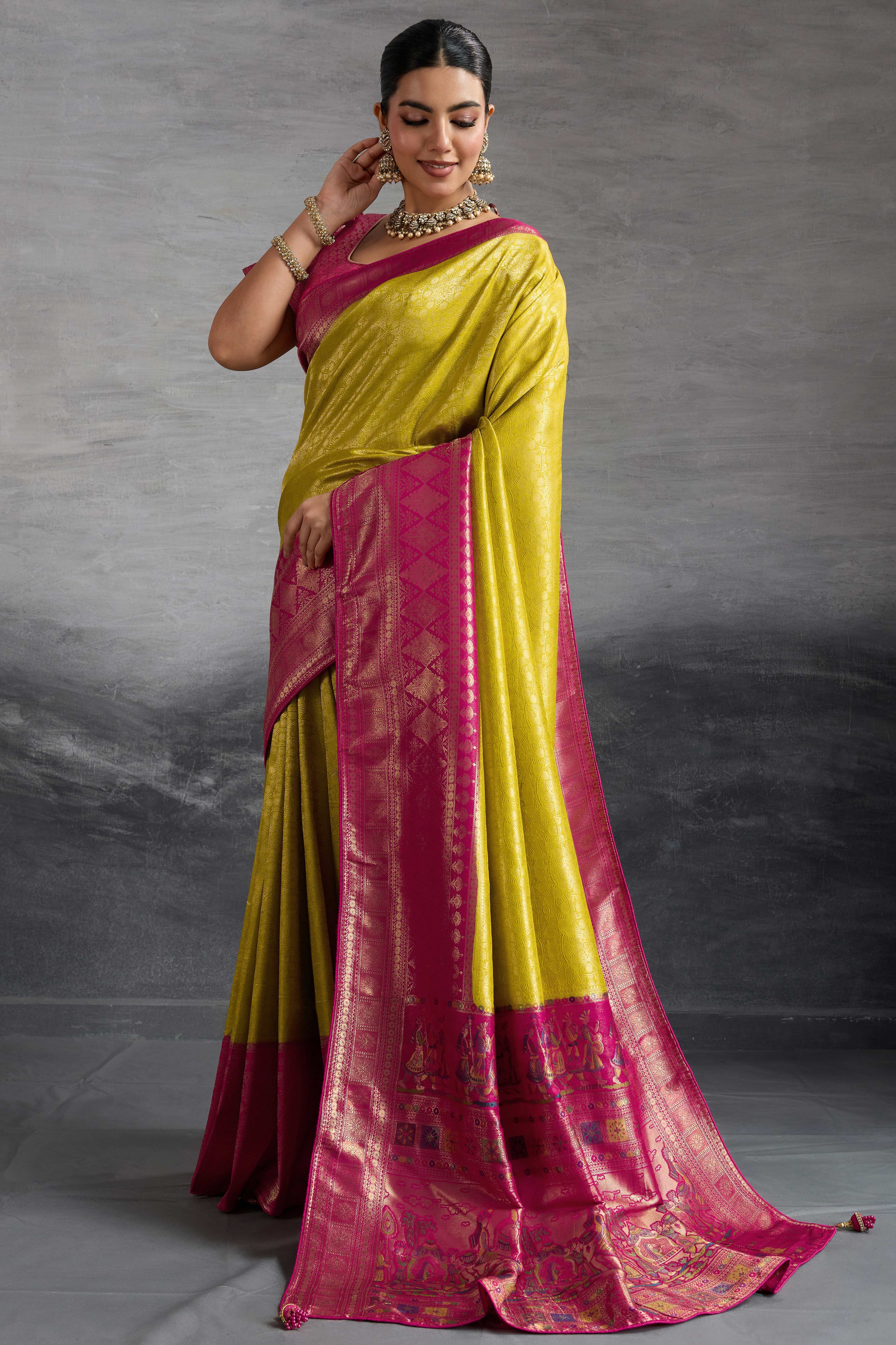 Lime Yellow Silk Kanjivaram Silk Saree Enhanced With Meenakari Weaving Borders