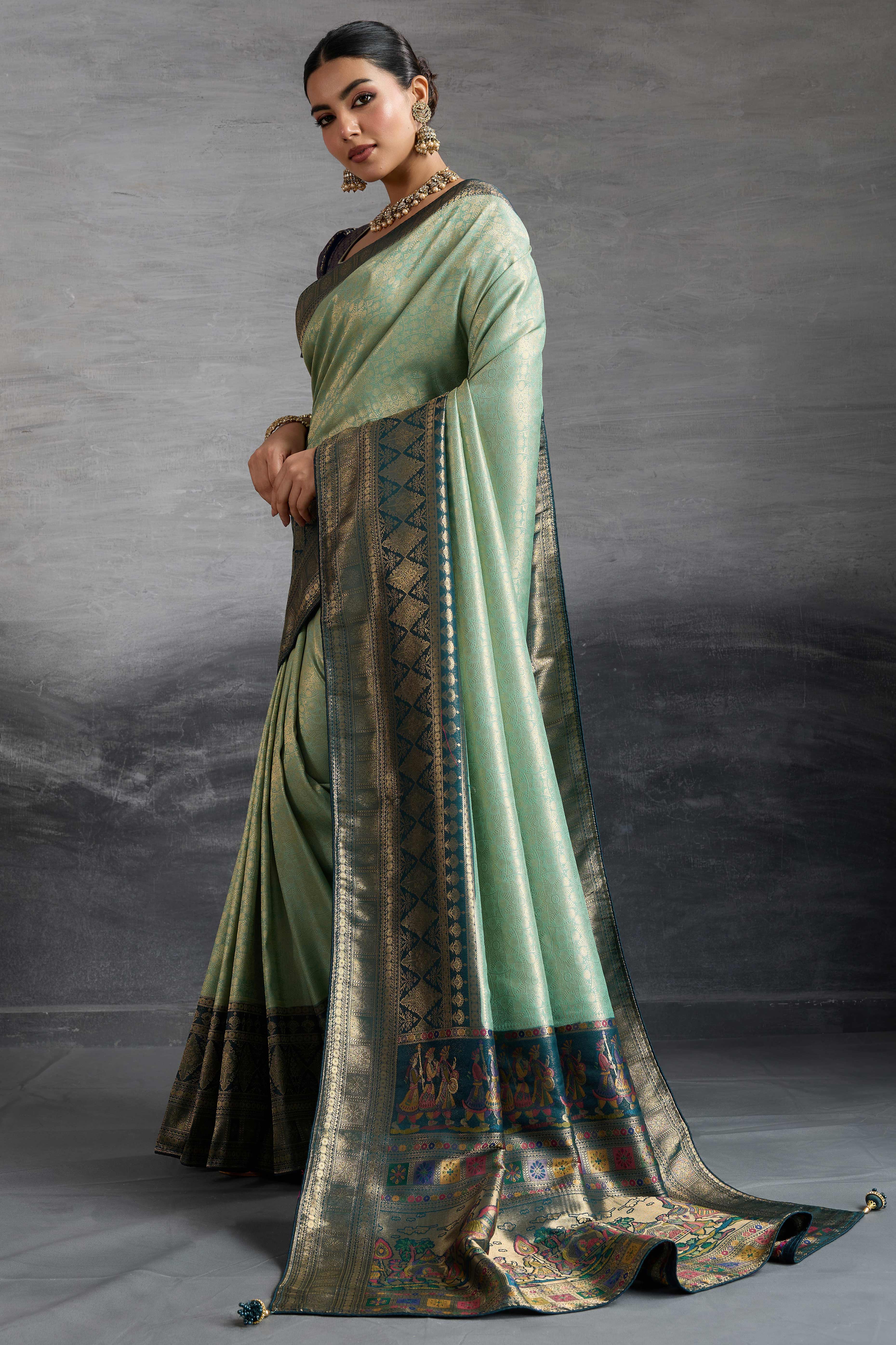 Sea Green Silk Kanjivaram Silk Saree Enhanced With Meenakari Weaving Borders
