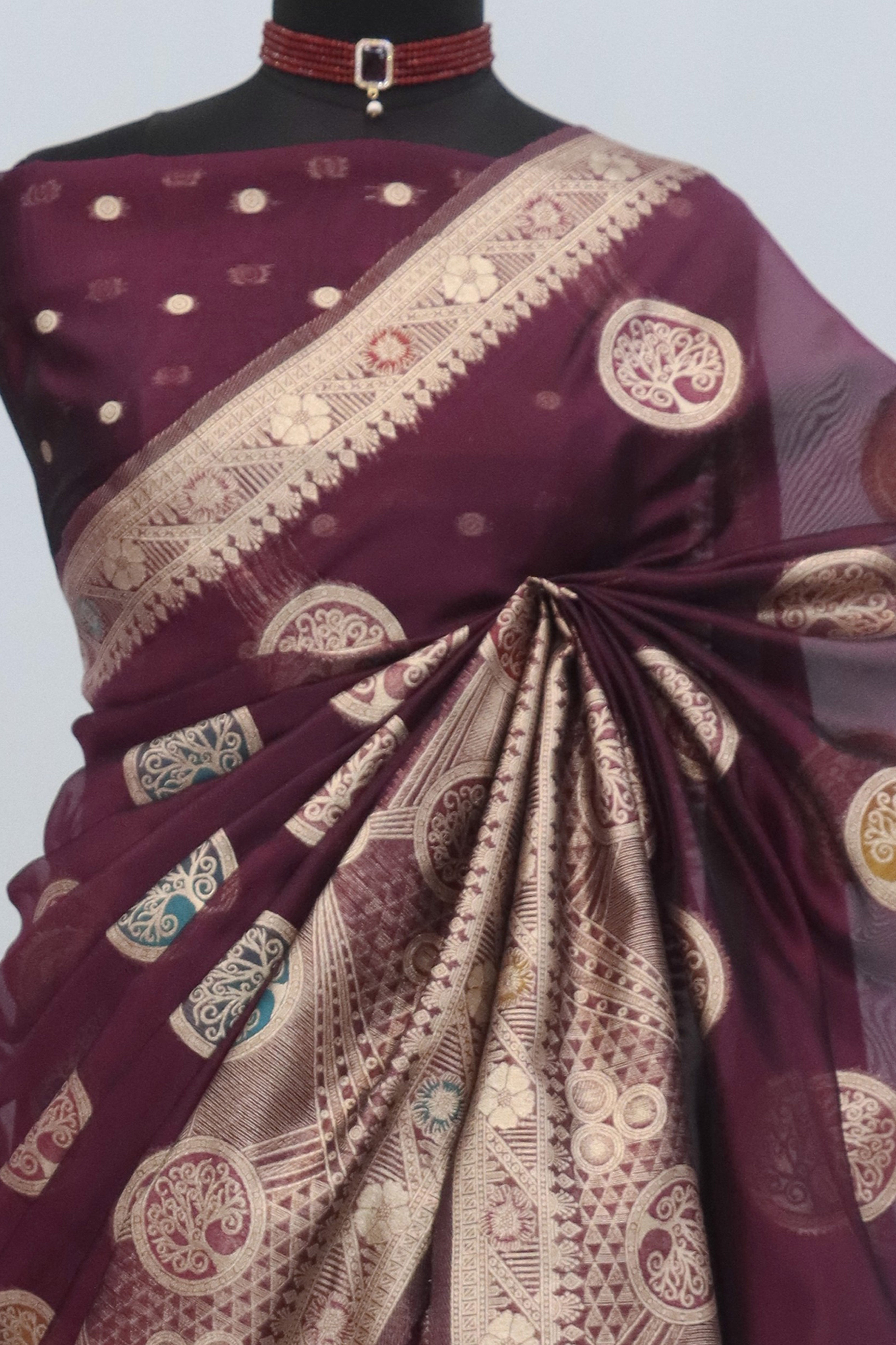 Charming Wine Zari Woven Floral Organza Saree Accented With Digital Printed Pallu & Latkan