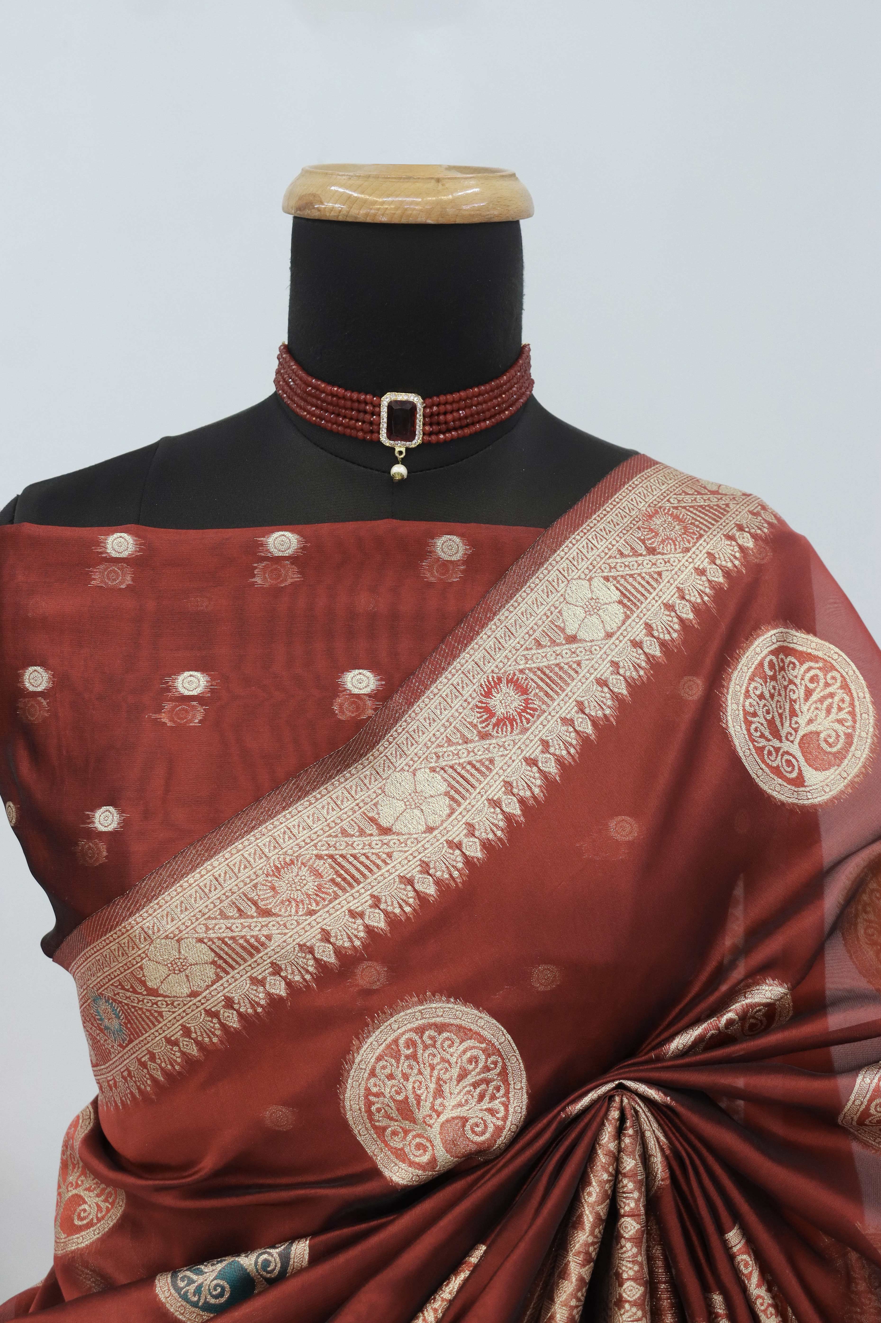 Charming Maroon Zari Woven Floral Organza Saree Accented With Digital Printed Pallu & Latkan