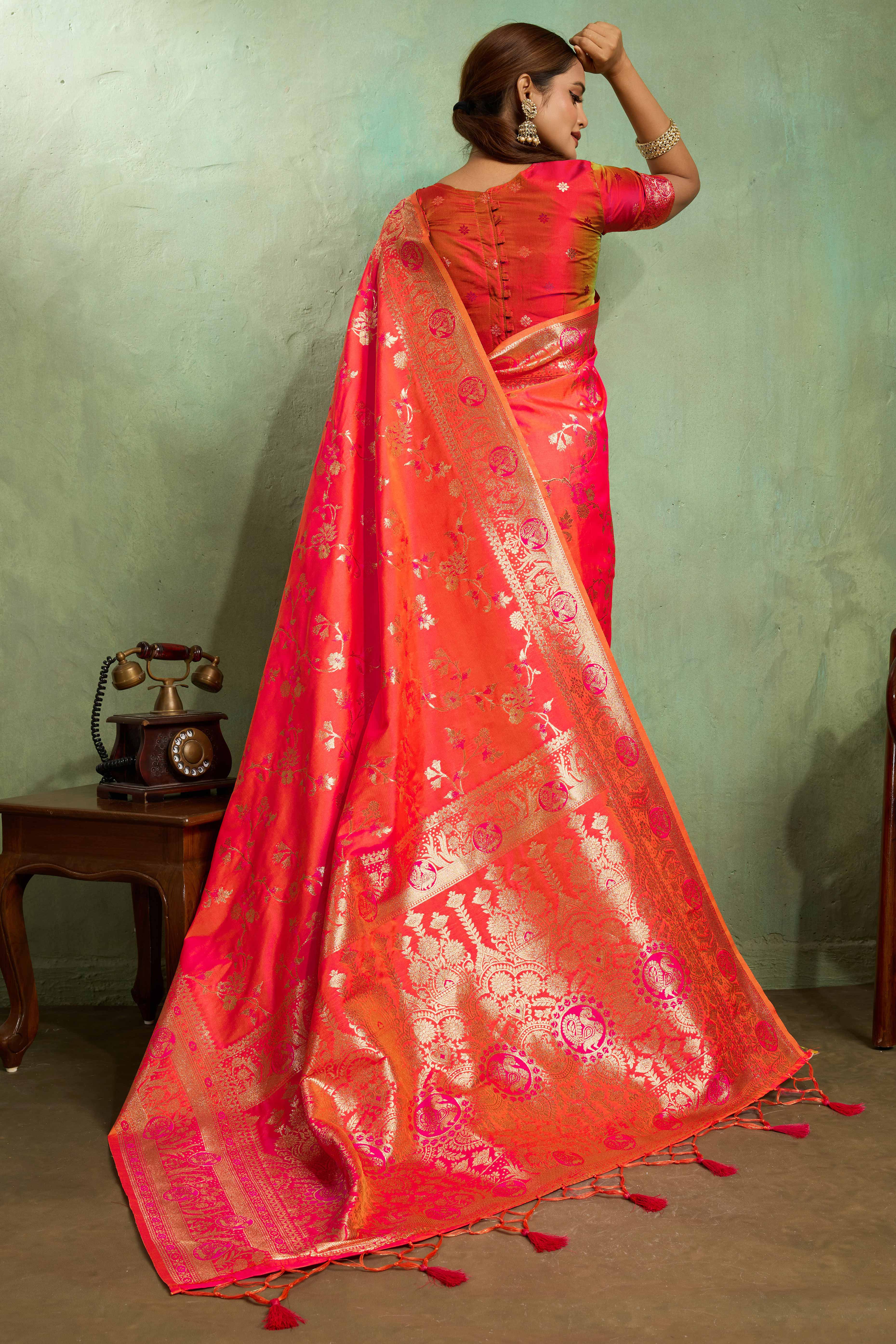 Coral Red Dual Tone Banarasi Silk Saree Accented with Meenakari Weaves