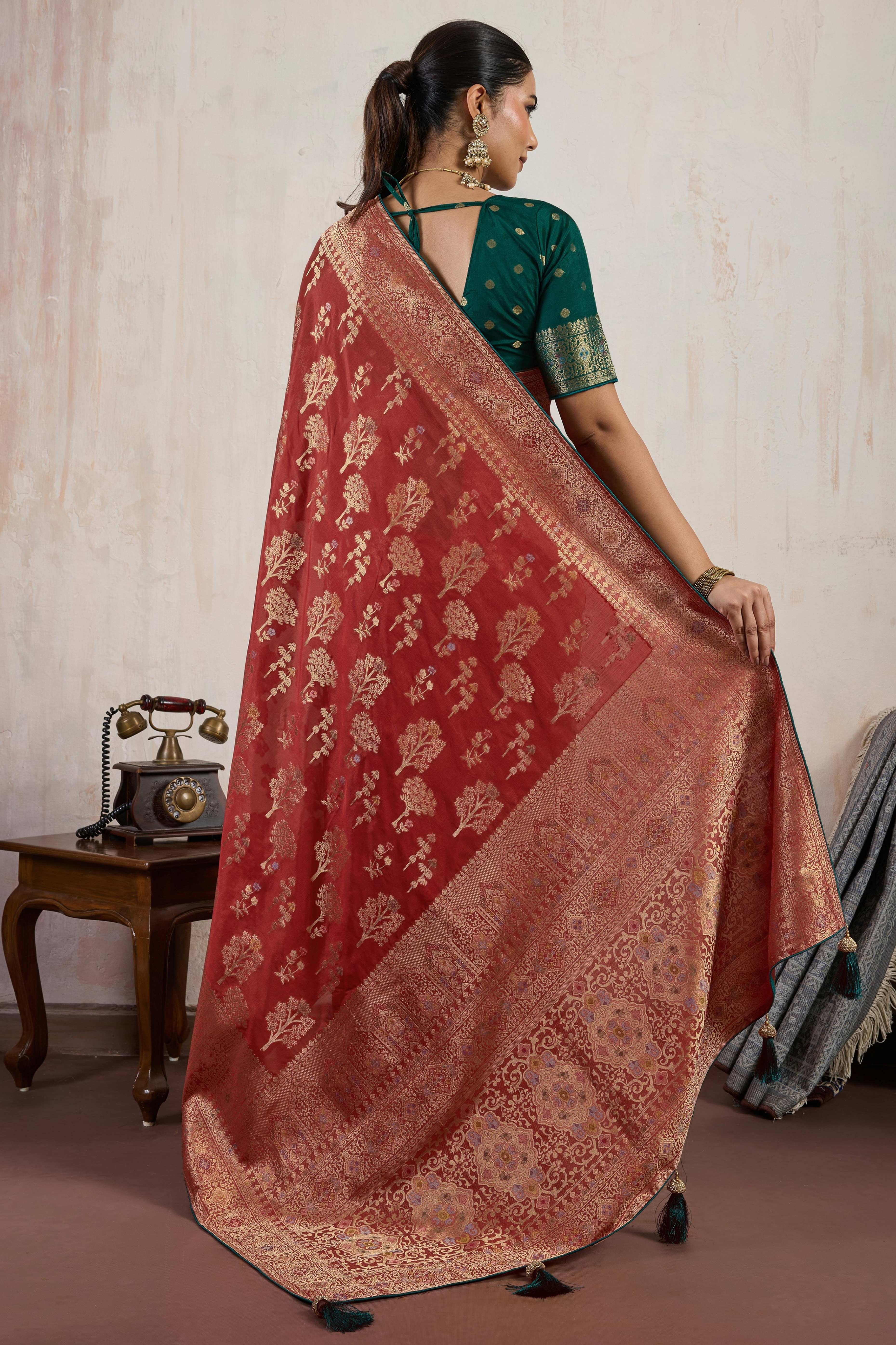 Maroon Traditional Pure Silk Saree Highlighted with Luxurious Meenakari Zari Weaving Accents