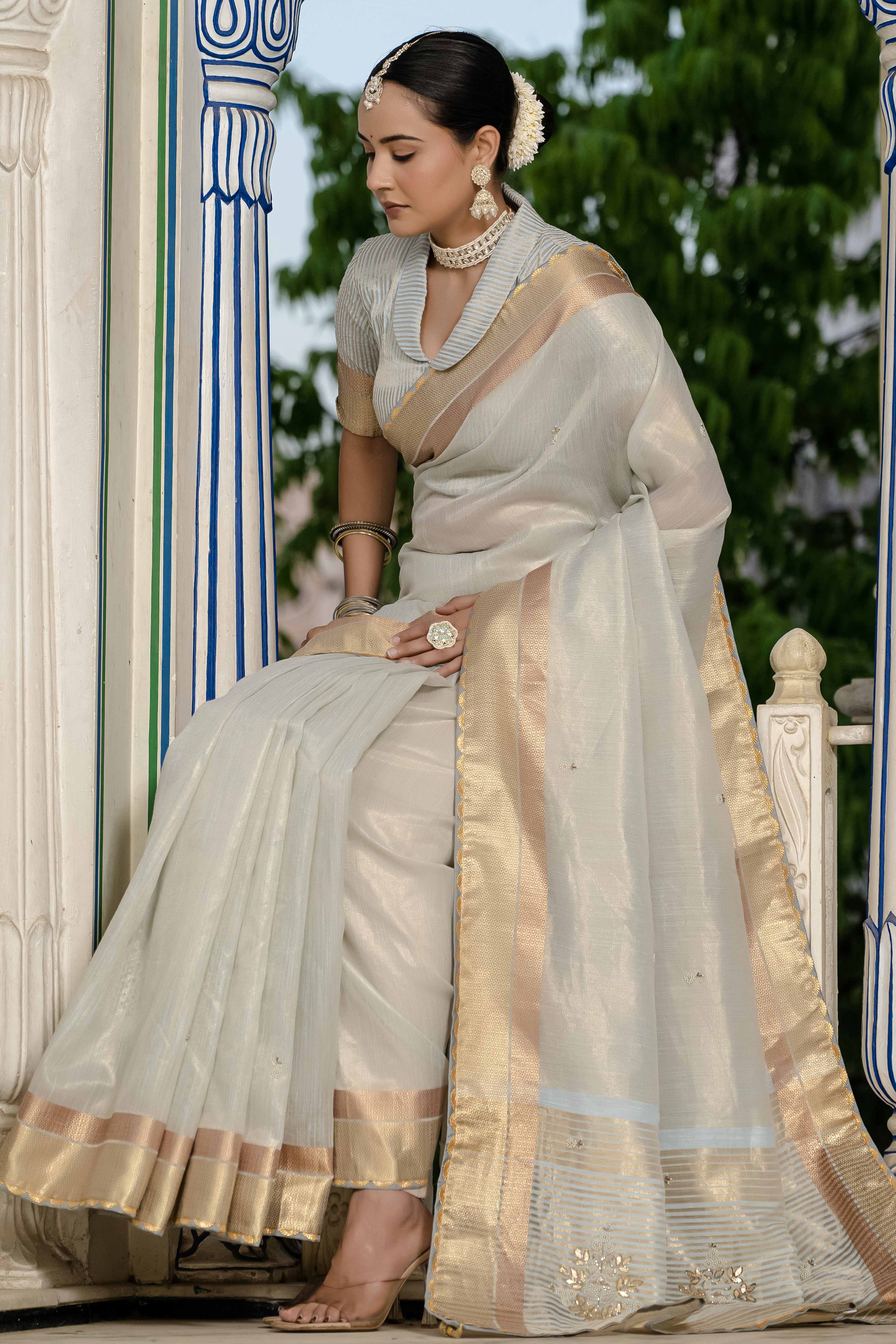 Sky Blue Tissue Linen Saree Featuring Intricate Zari and Beadwork