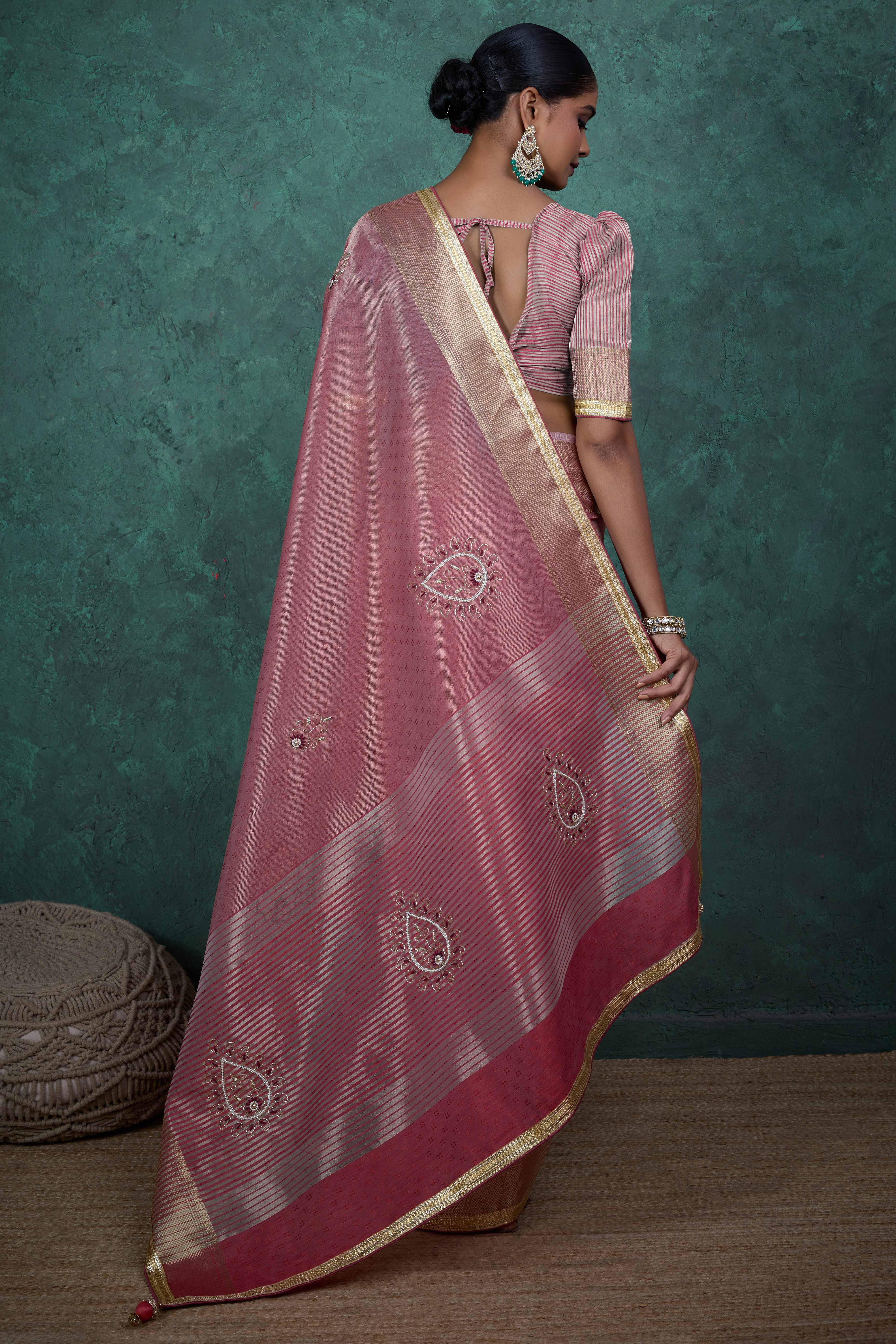 Pink Woven Linen Tissue Saree Featuring Beads Embellishment