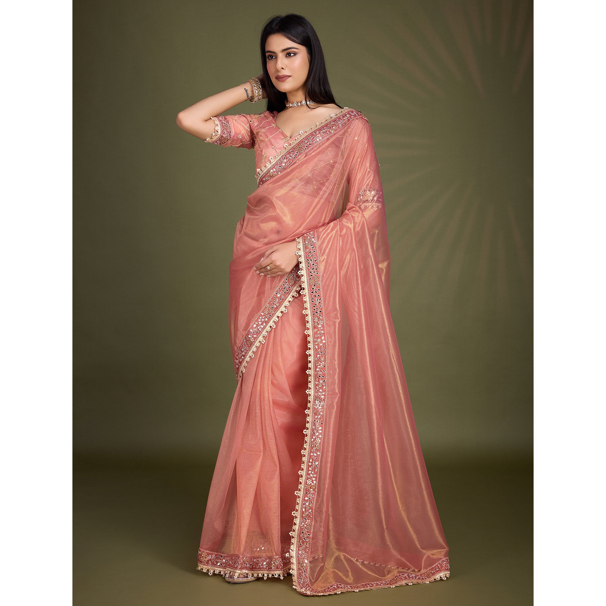 Peach Sequins Embroidery With Mirror Handwork Twill Net Saree