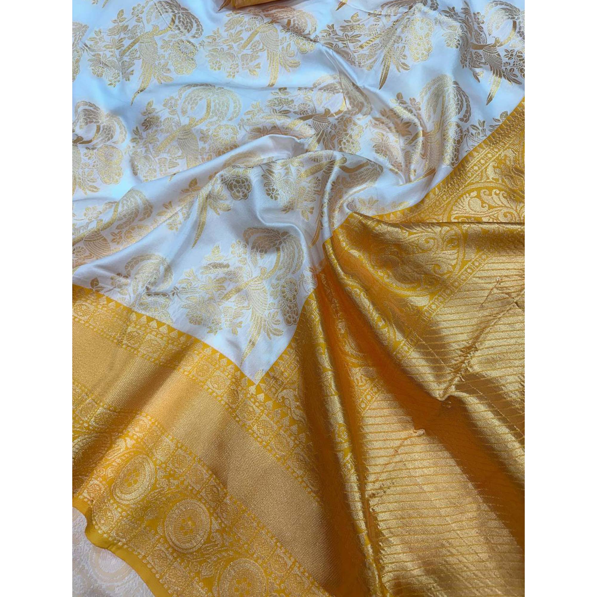 Charming White & Yellow Floral Zari Woven Lichi Banarasi Silk Saree