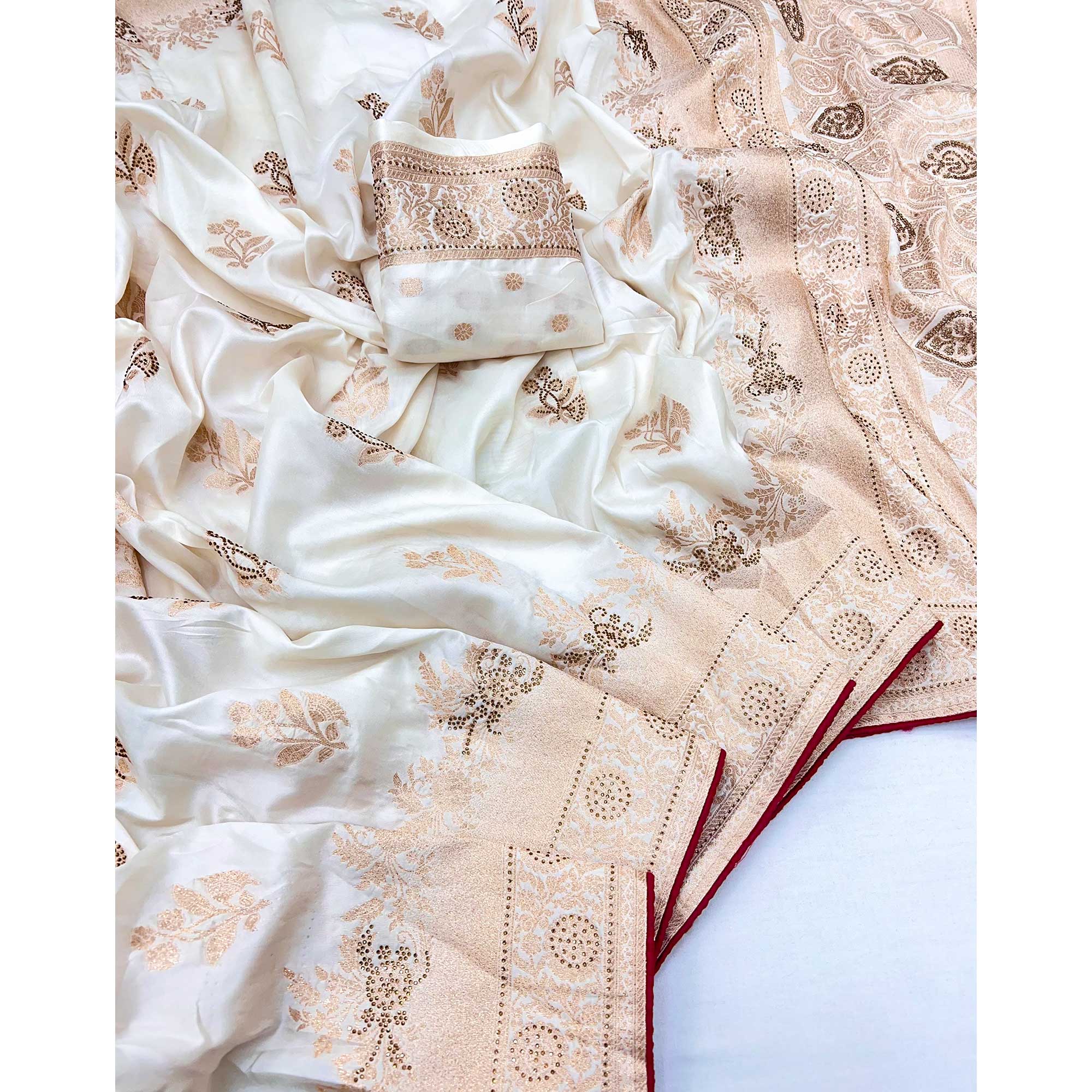 Offwhite Elegant White Dola Silk Saree with Intricate Weaving and Sparkling Stonework