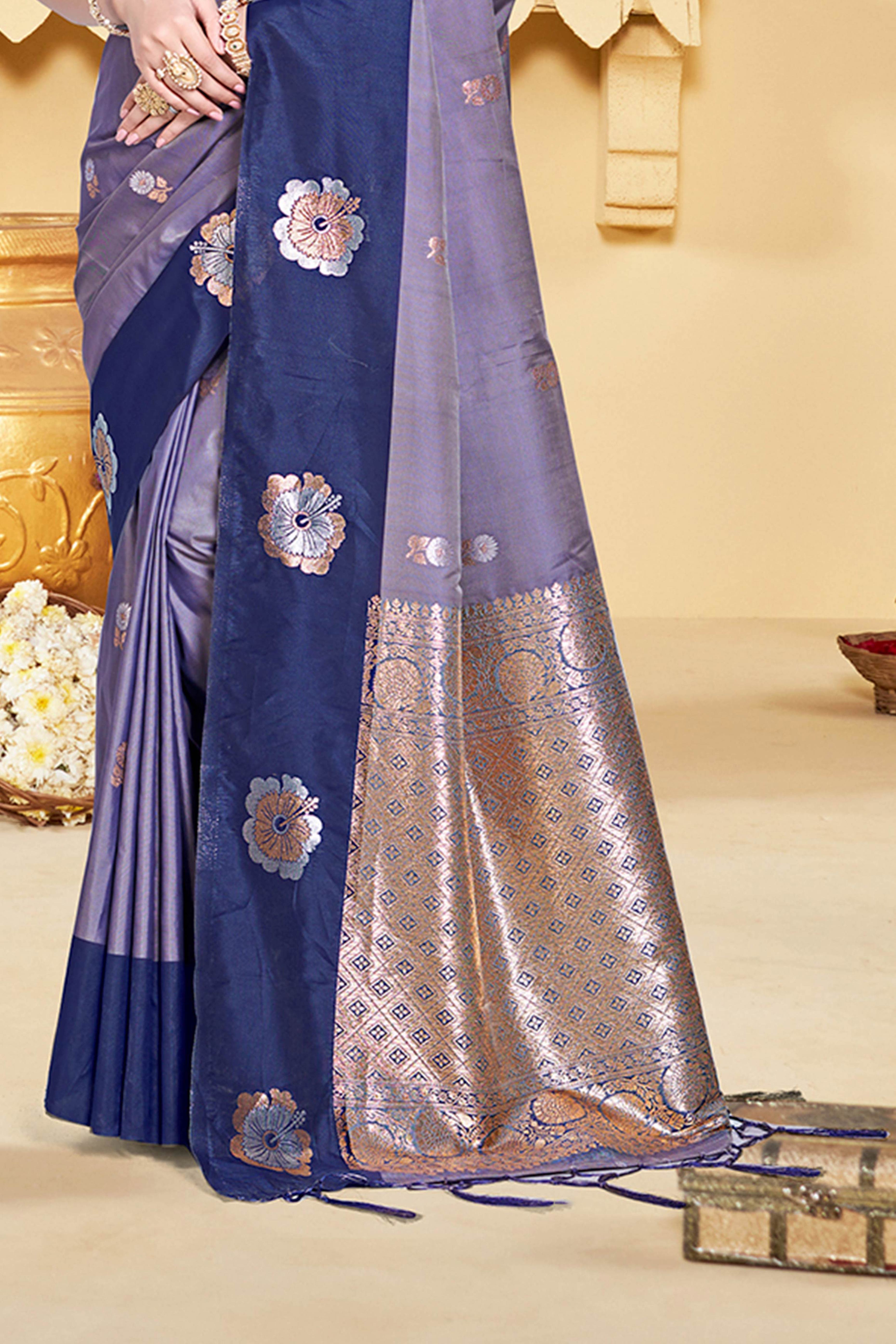 Charming Light Navy Blue Floral Zari Weaving Silk Blend Saree Enhanced With Stylish Tassel Pallu