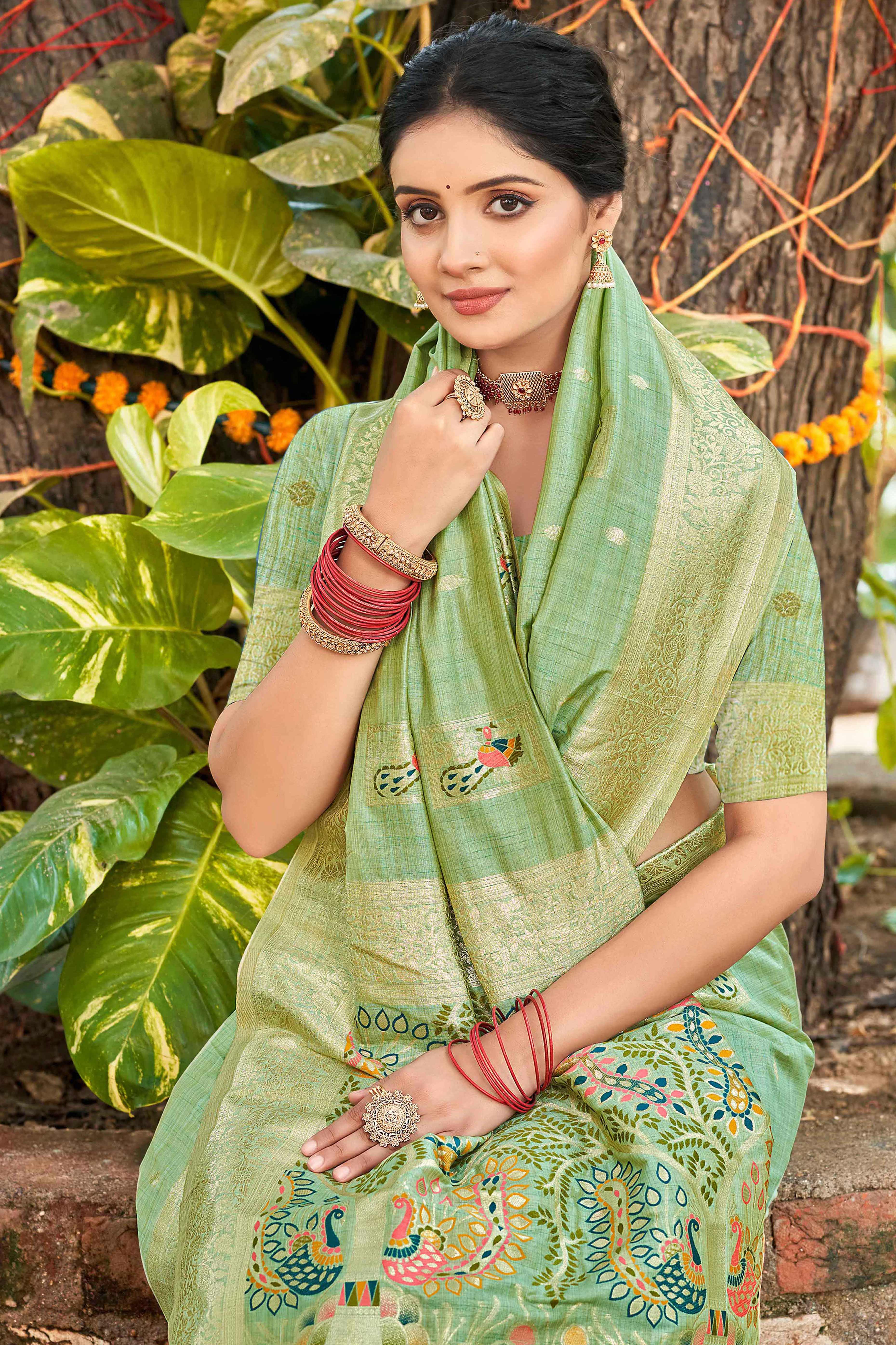 Sea Green Floral & Peacock Motif Zari Woven Assam Silk Blend Saree With Graceful Tassel Pallu