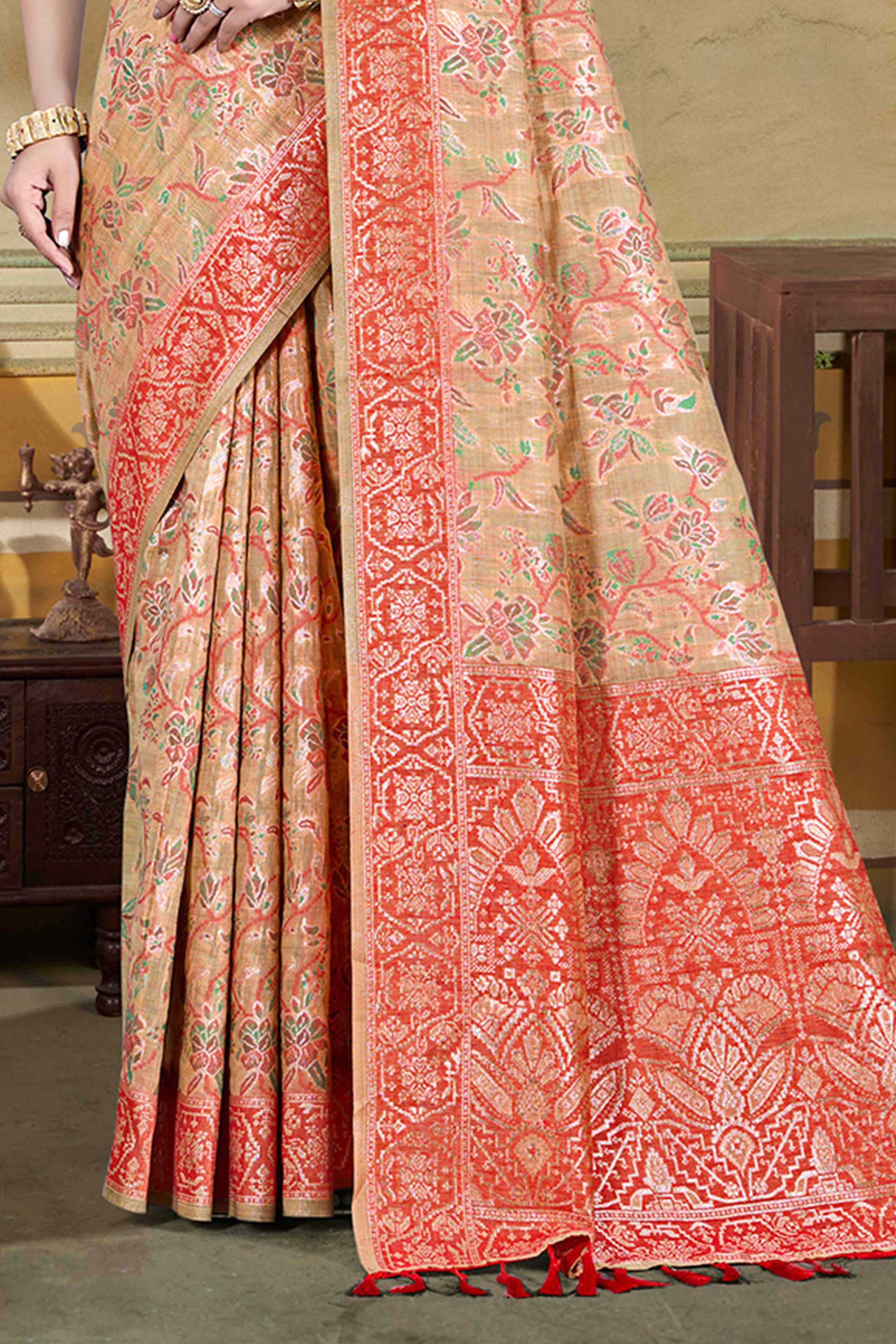 Alluring Light Peach Floral Zari Weaving Cotton Silk Saree With Graceful Tassel Pallu