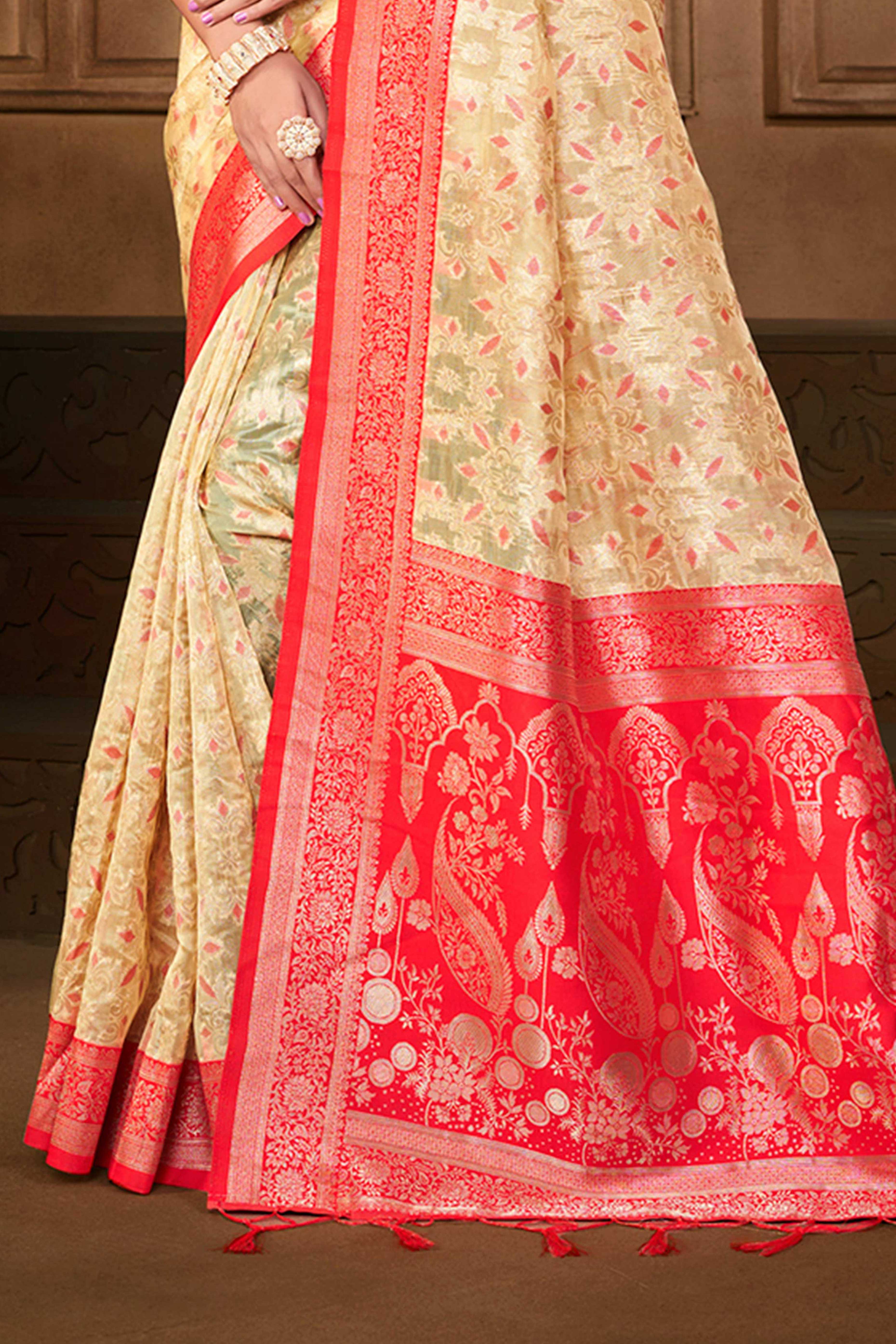 Stunning Cream & Pink Floral Weaving Silk Blend Saree Enhanced With A Stylish Tassel Pallu