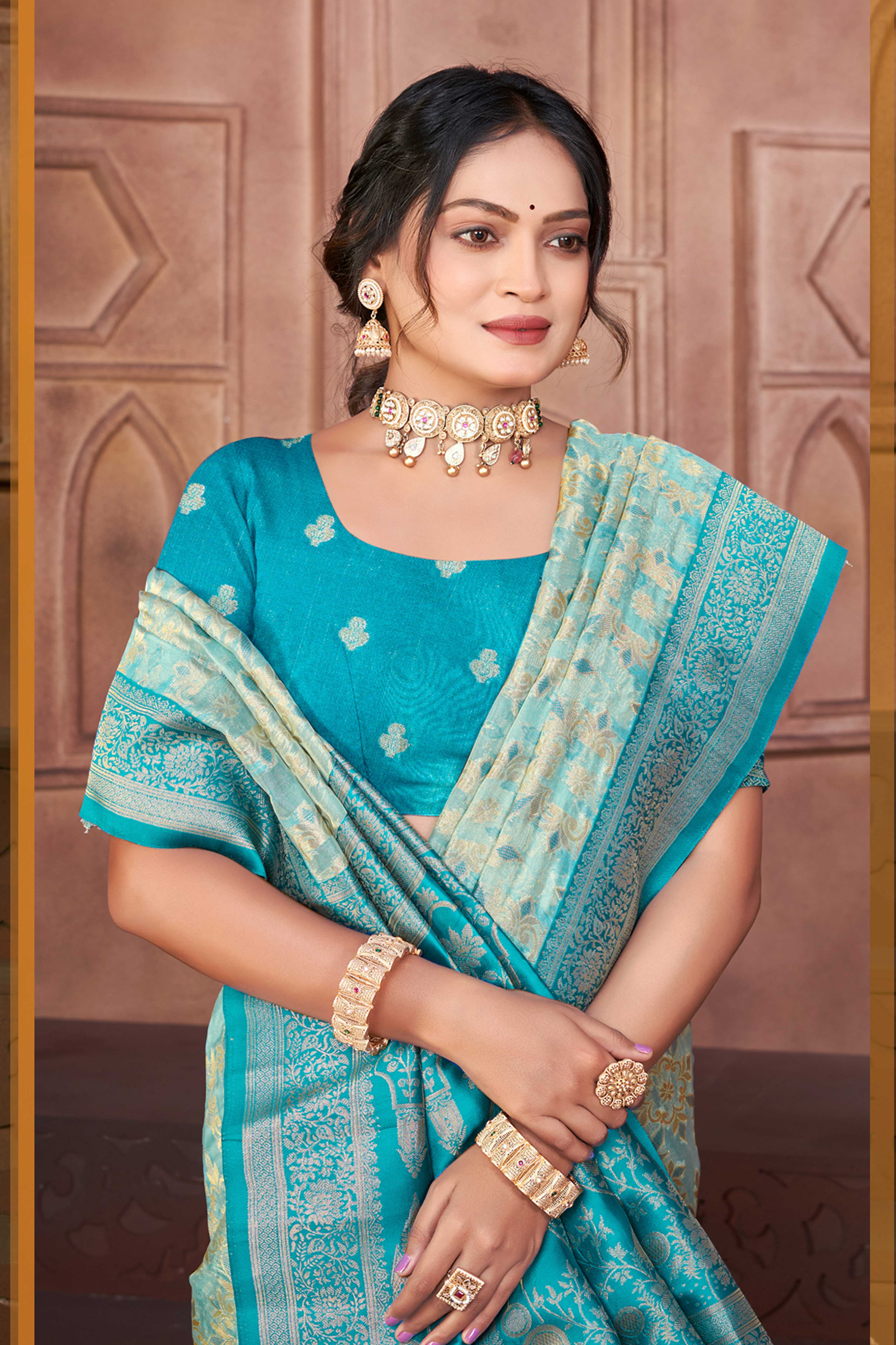 Stunning Blue Floral Weaving Silk Blend Saree Enhanced With A Stylish Tassel Pallu