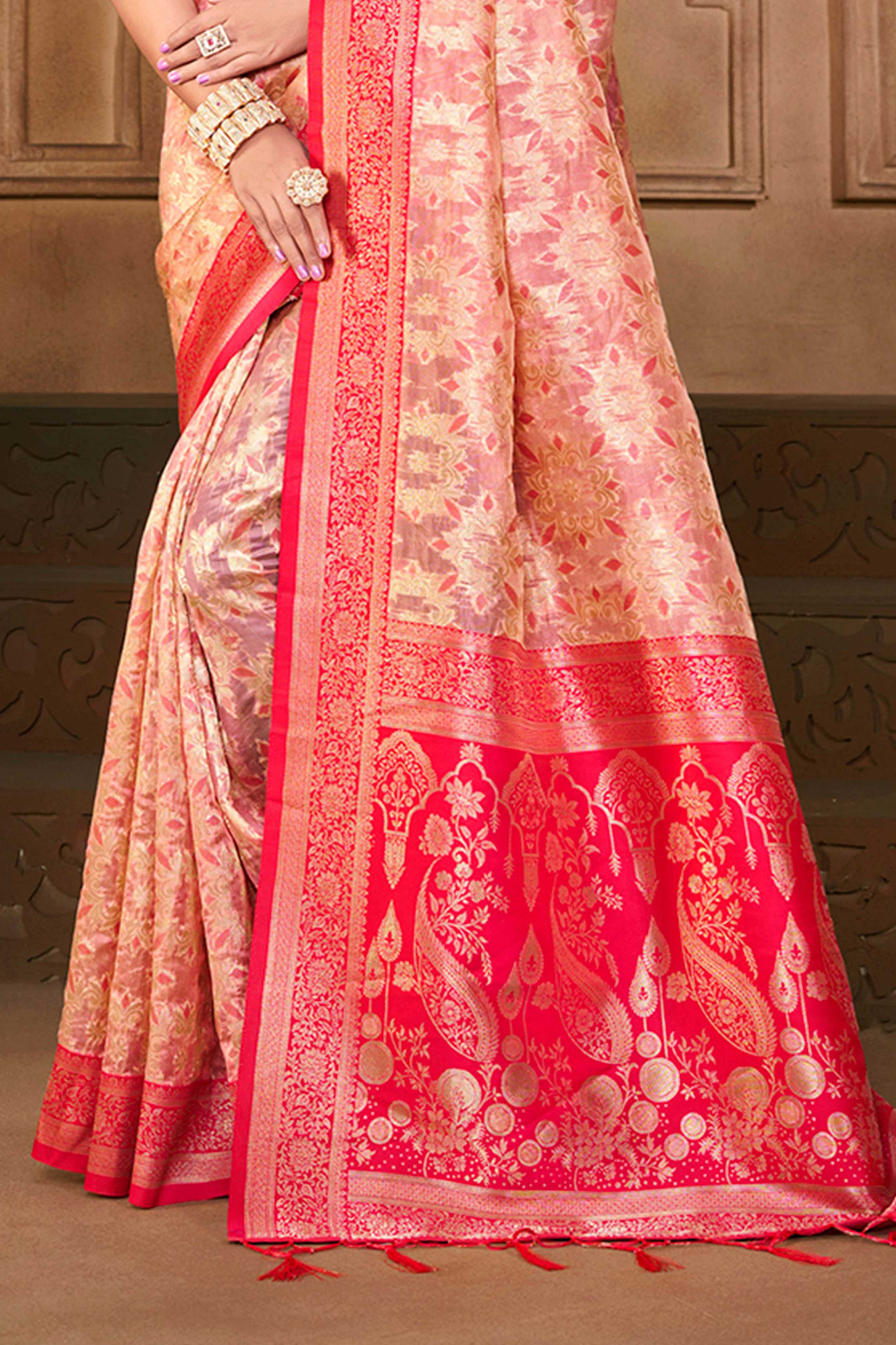 Stunning Pink Floral Weaving Silk Blend Saree Enhanced With A Stylish Tassel Pallu