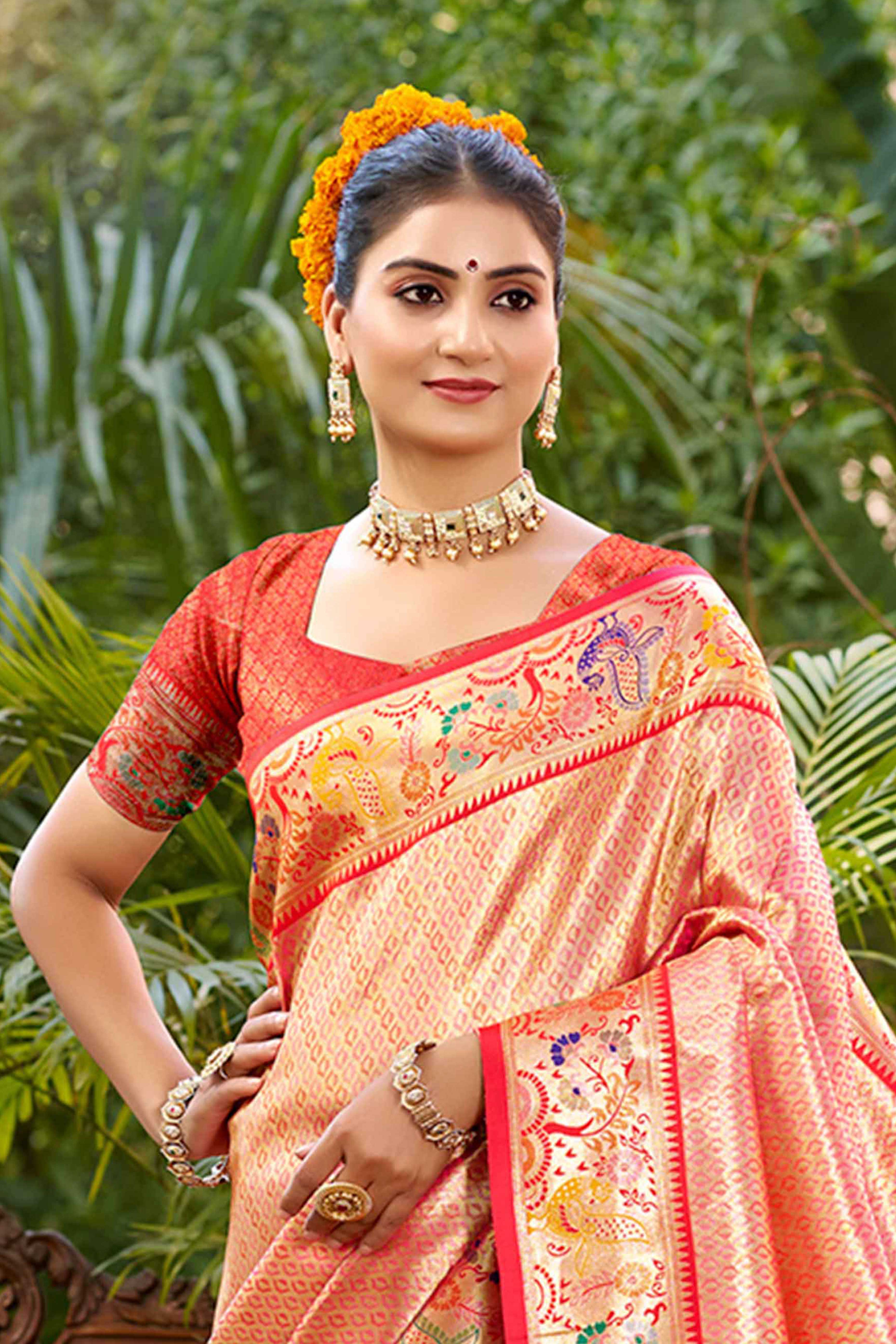 Graceful Pink Silk Blend Saree Adorned With Intricate Zari Weave & Peacock Motif Pallu