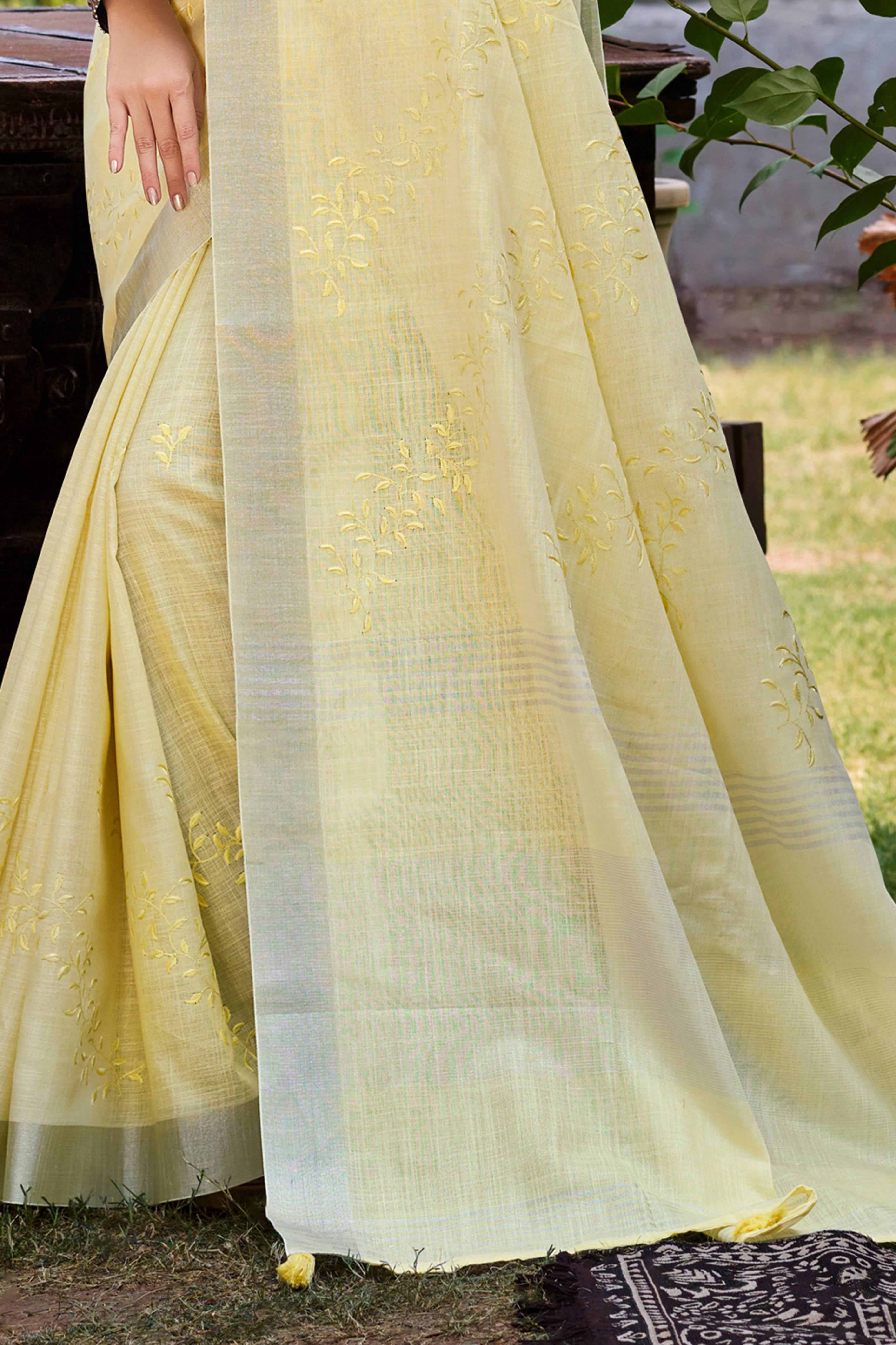 Elegant Yellow Linen Saree Featuring Intricate Woven & Embroidered Patterns