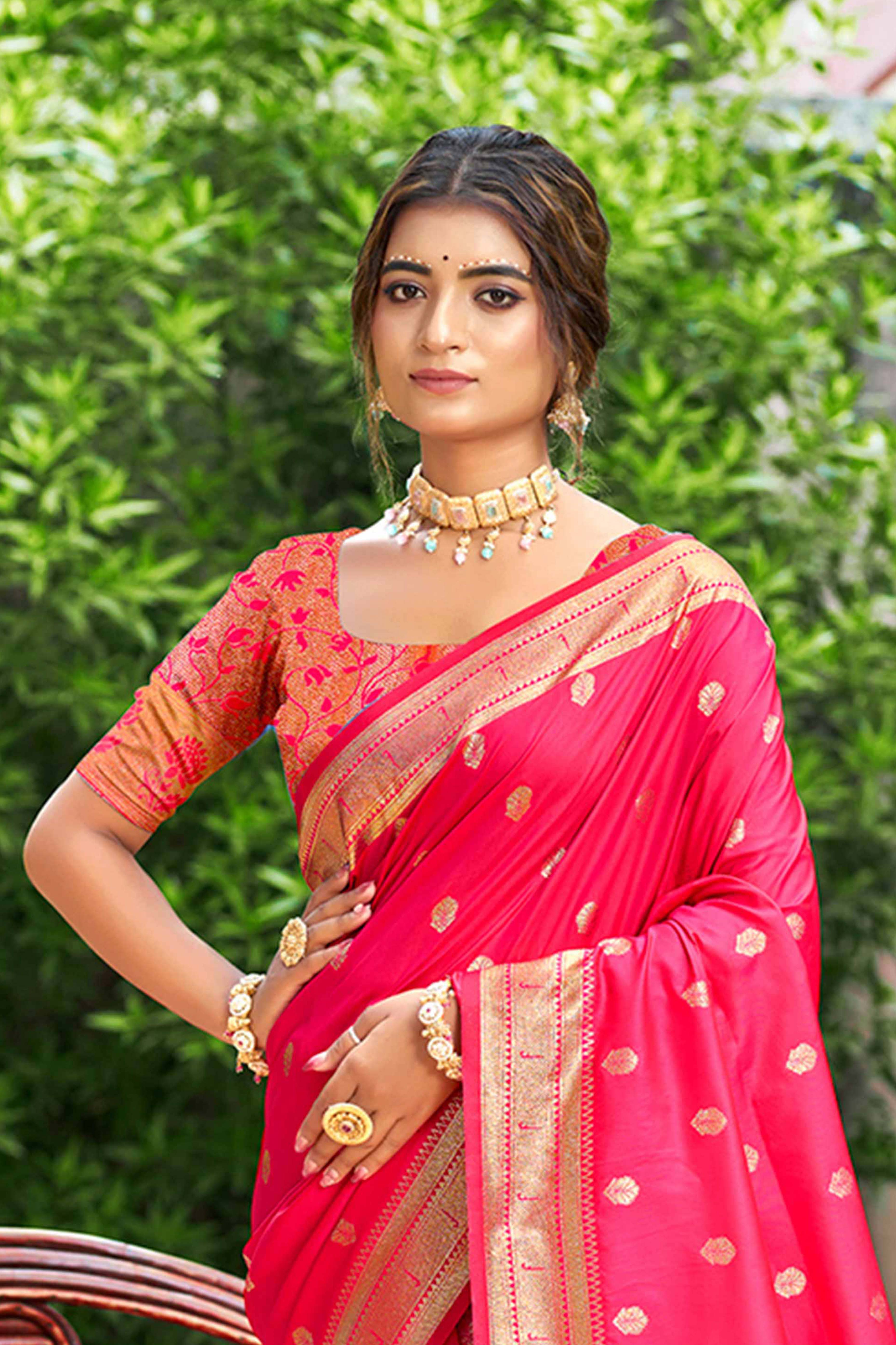 Rani Pink Zari Weaving Silk Blend Saree Adorned With Intricate Peacock Motif Pallu & Graceful Tassel
