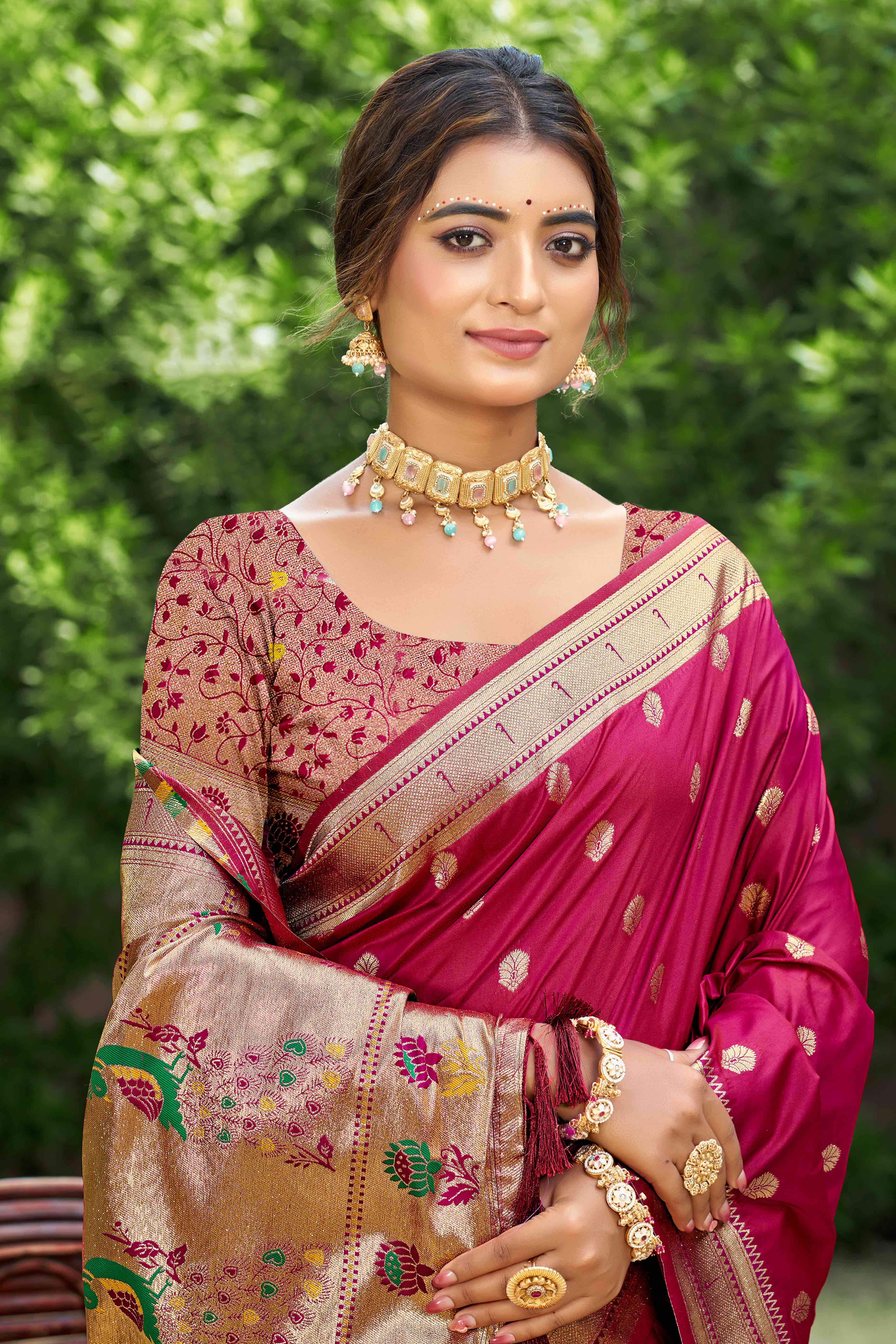 Deep Magenta Zari Weaving Silk Blend Saree Adorned With Peacock Motif Pallu & Graceful Tassel