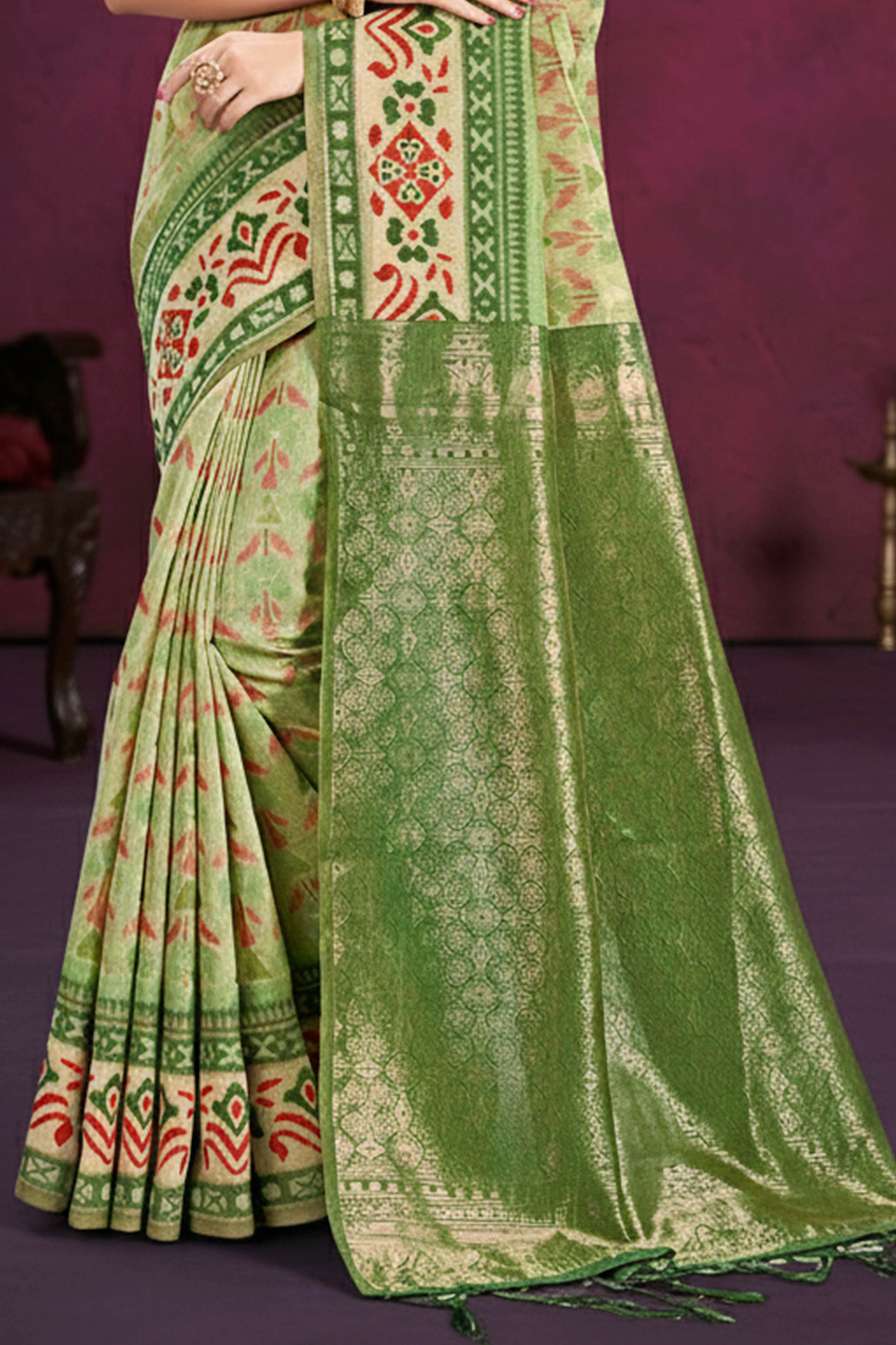Designer Green Cotton Silk Saree Showcasing Delicate Floral Weaving & Tassel Pallu