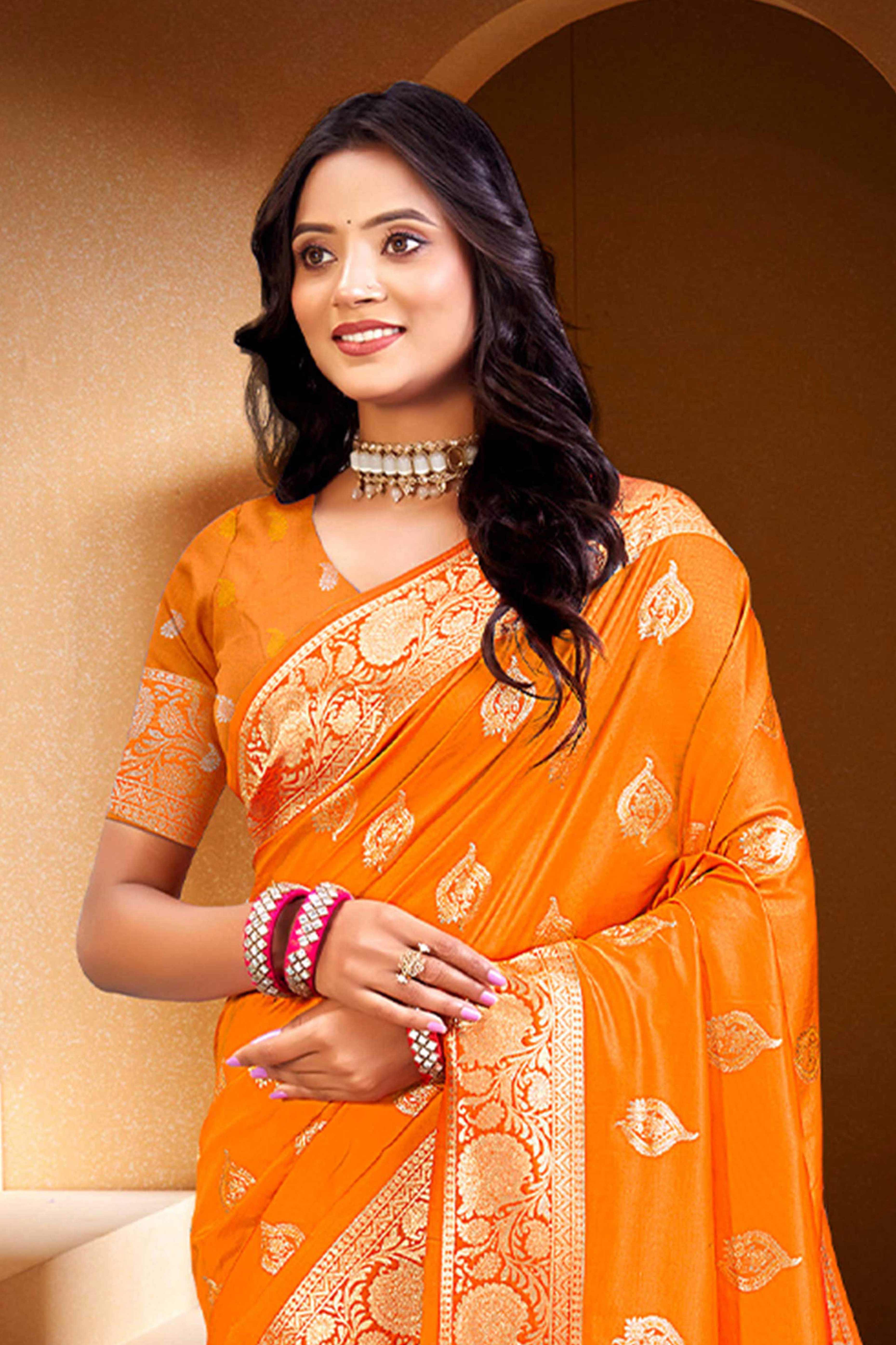 Luxury Orange Floral Weaving Silk Blend Saree Finished With A Digital Peacock Printed Pallu