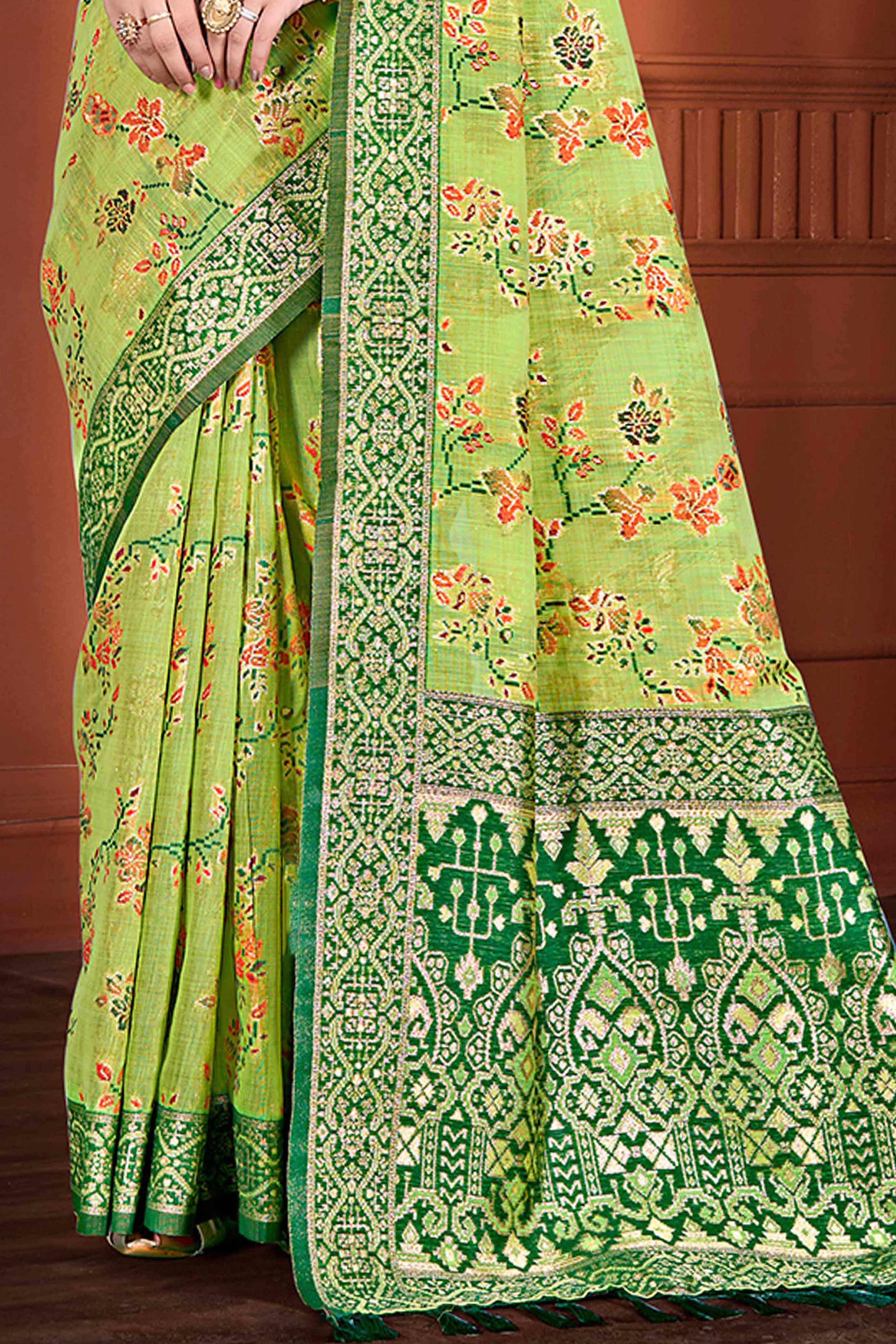 Stunning Green Floral Zari Weaving Cotton Silk Meena Saree With Tassel Pallu