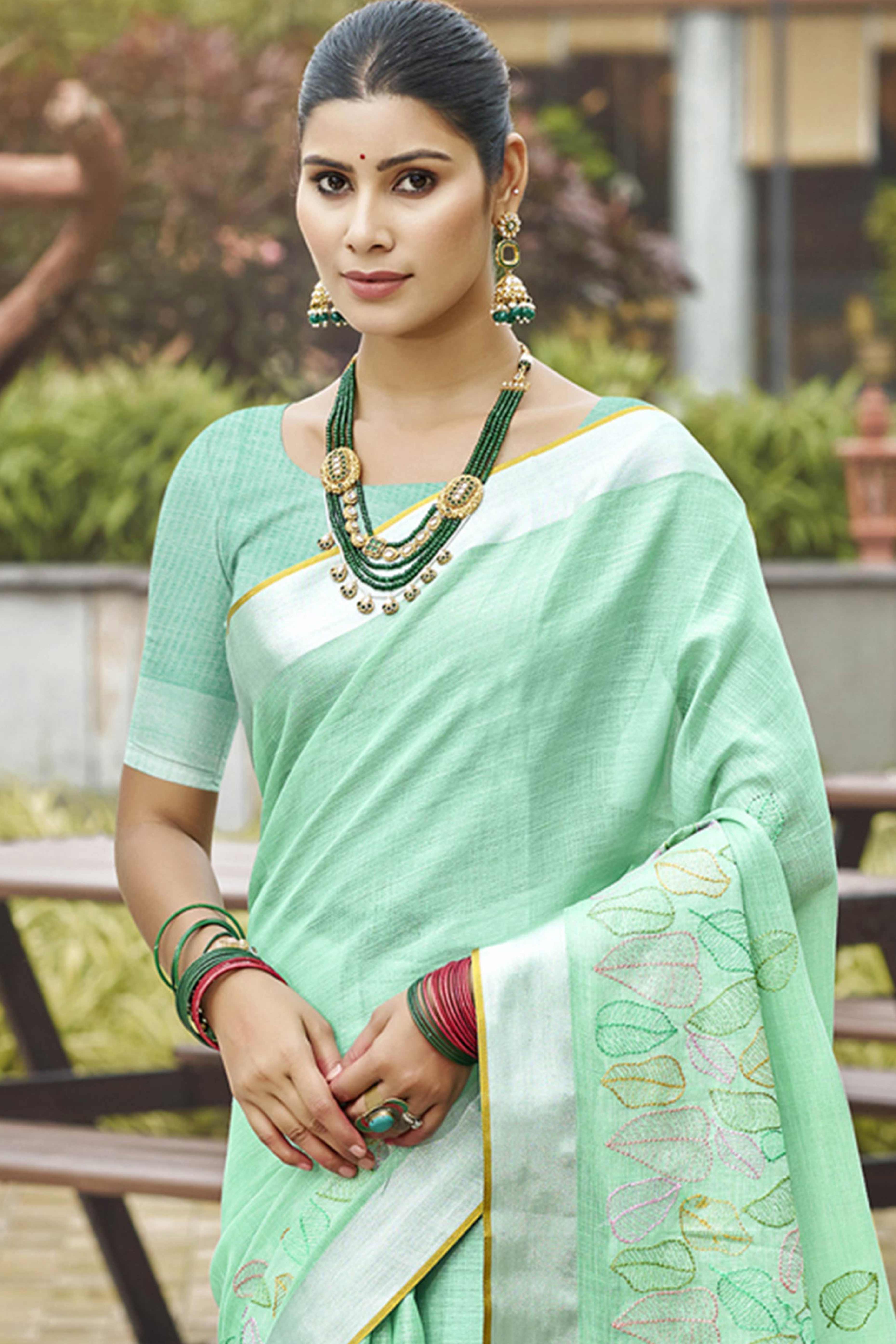 Classic Sea Green Leaf Pattern Thread Embroidery Work Linen Saree With Tassel Pallu