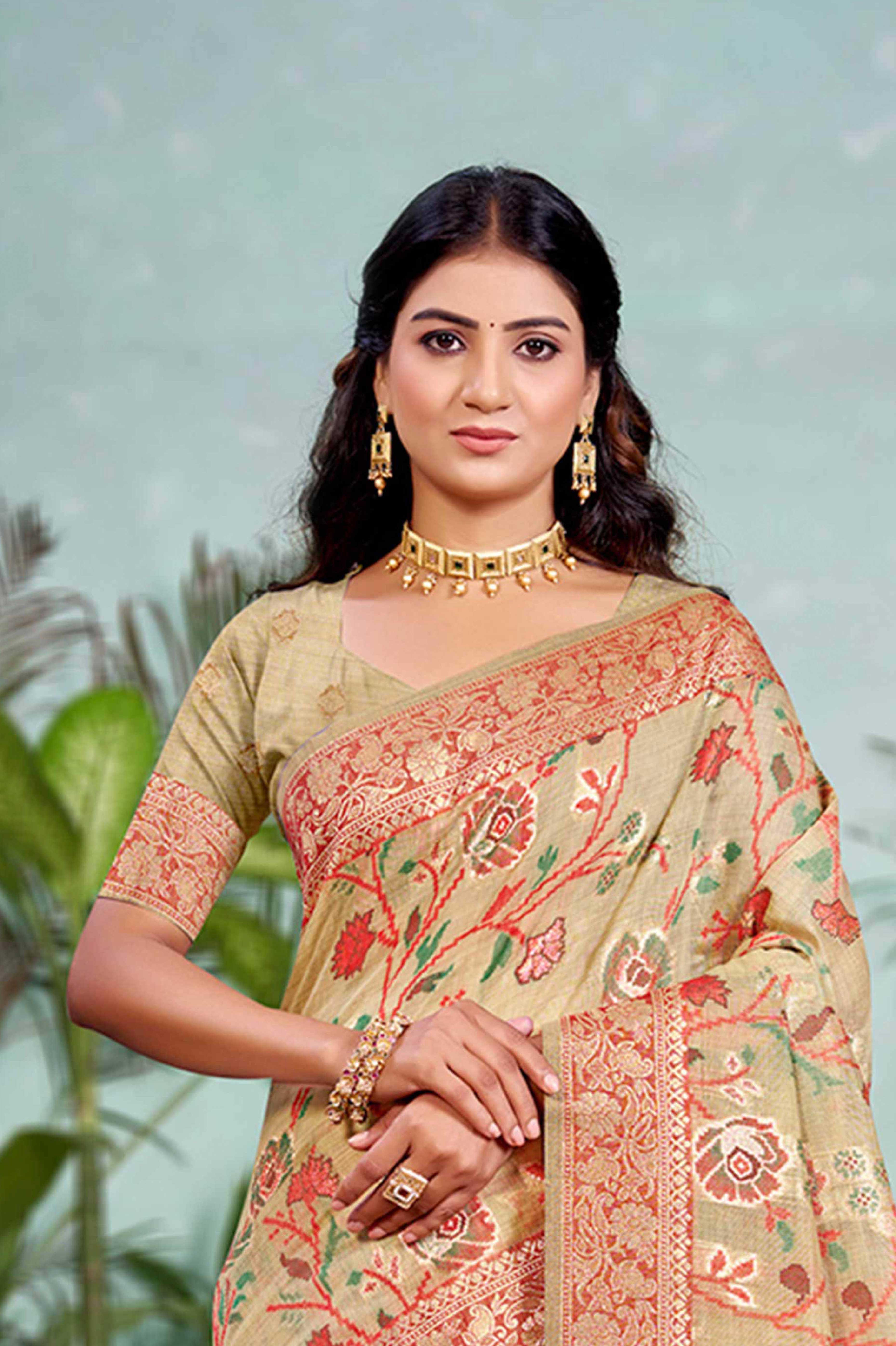 Captivating Beige Floral Zari Weaving Cotton Silk Saree Accented With Tassel Pallu