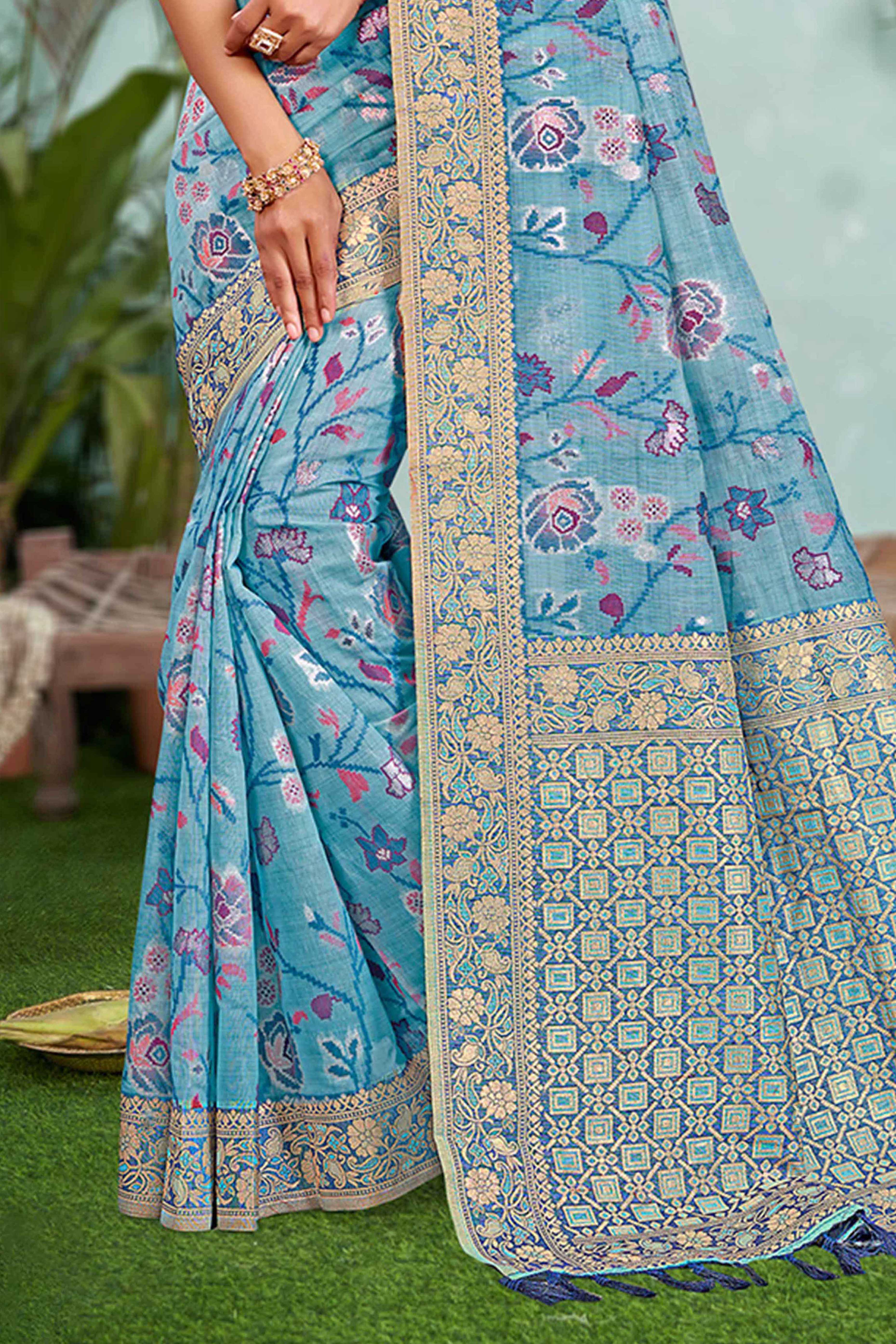 Captivating Blue Floral Zari Weaving Cotton Silk Saree Accented With Tassel Pallu
