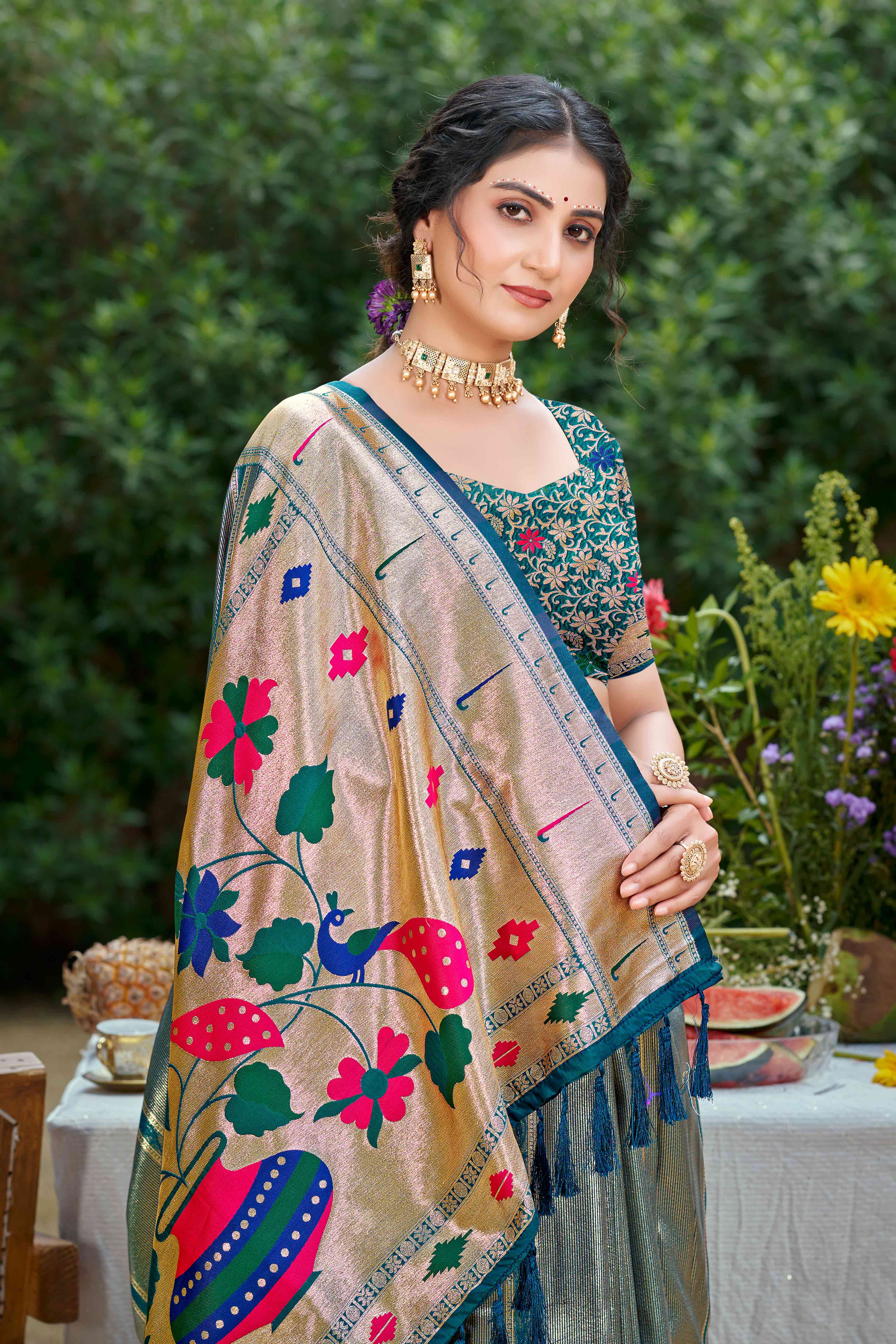 Teal Designer Weaving Silk Blend Saree Accented With Graceful Peacock & Floral Motif Pallu