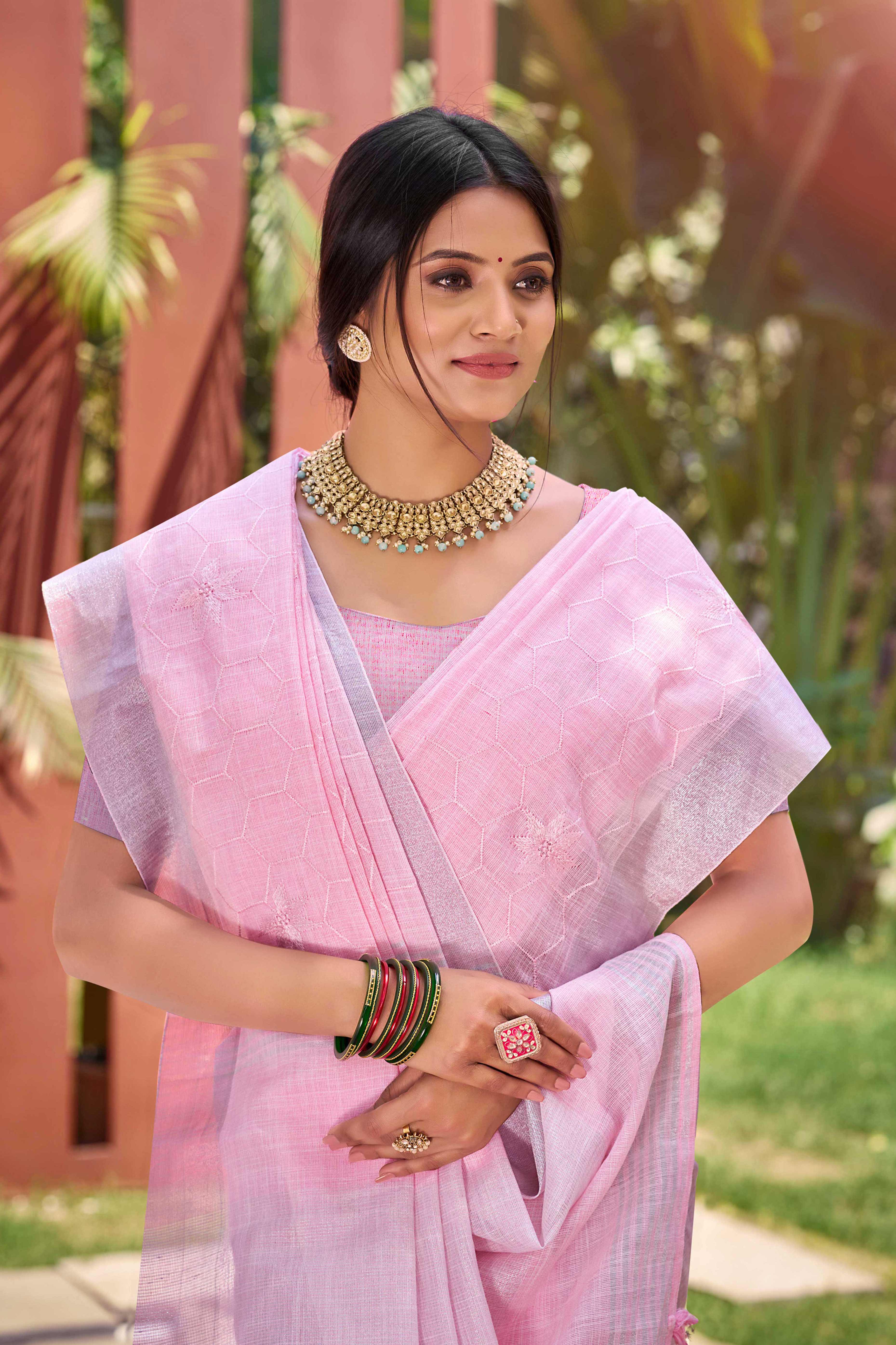 Pink Classic Linen Saree Enhanced With Fine Geometric Embroidery Work & Tassel Pallu