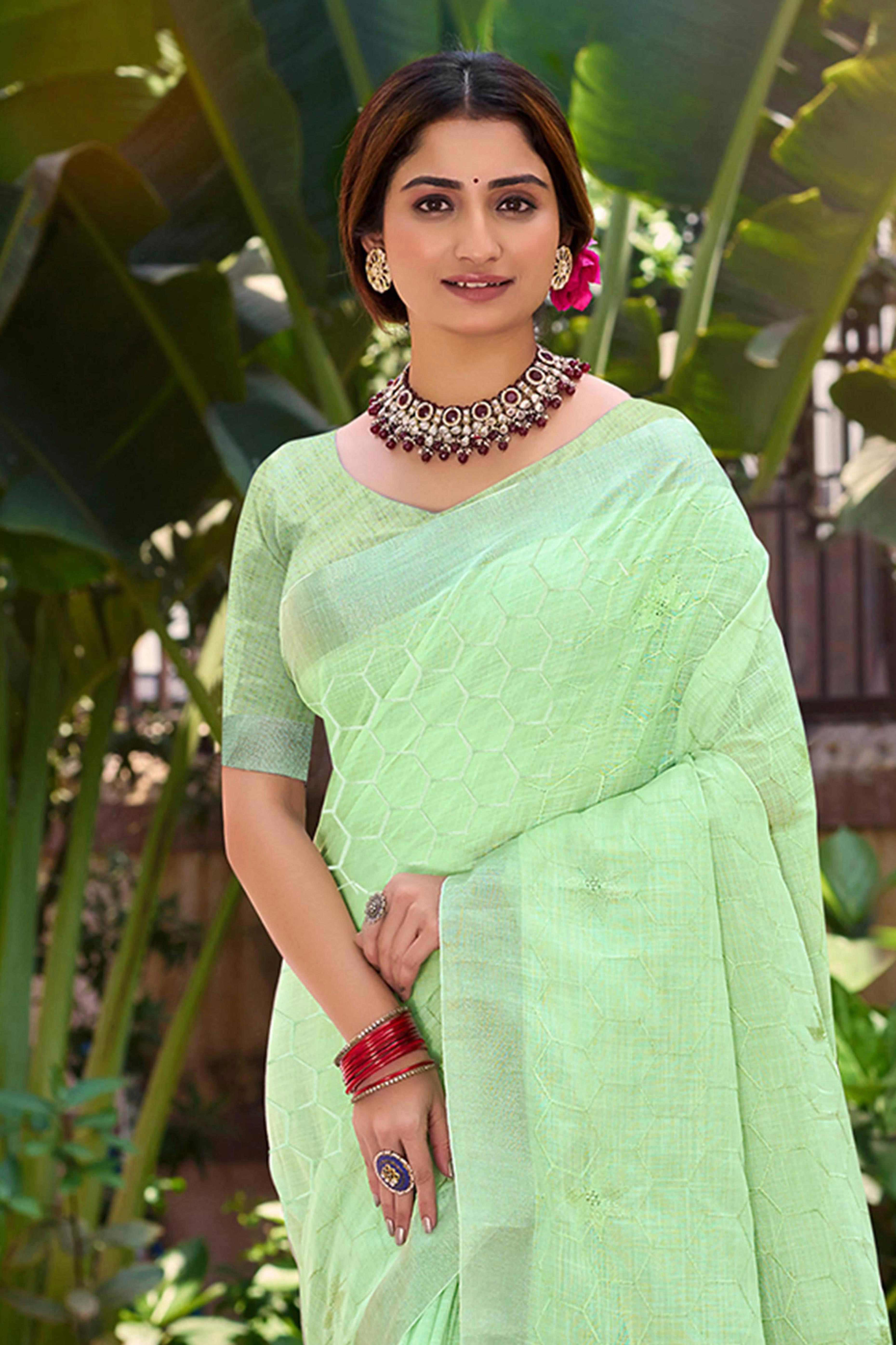 Light Green Classic Linen Saree Enhanced With Fine Geometric Embroidery Work & Tassel Pallu