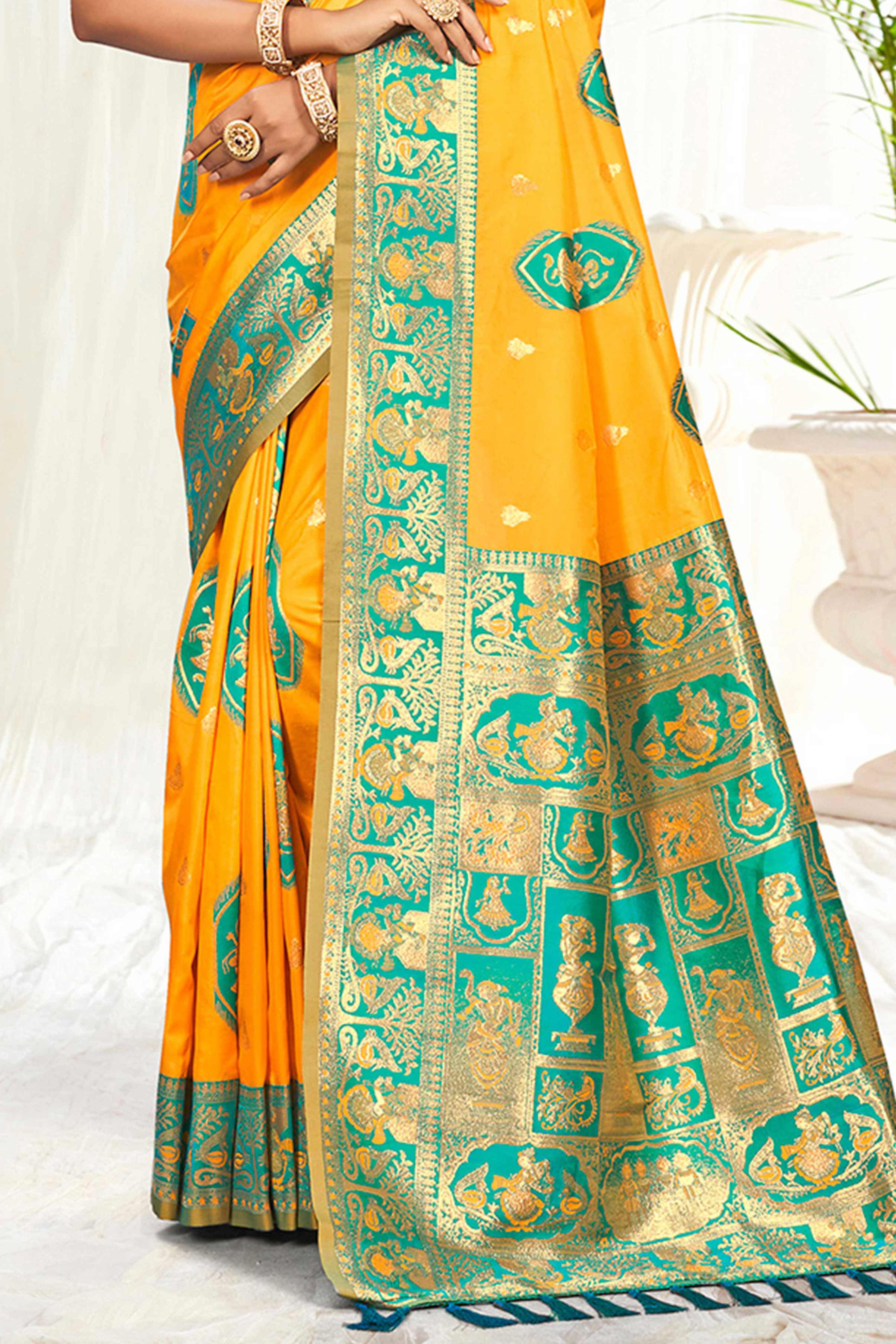 Mesmerizing Mustard Traditional style Weaving Silk Blend Saree With Graceful Tassel Pallu