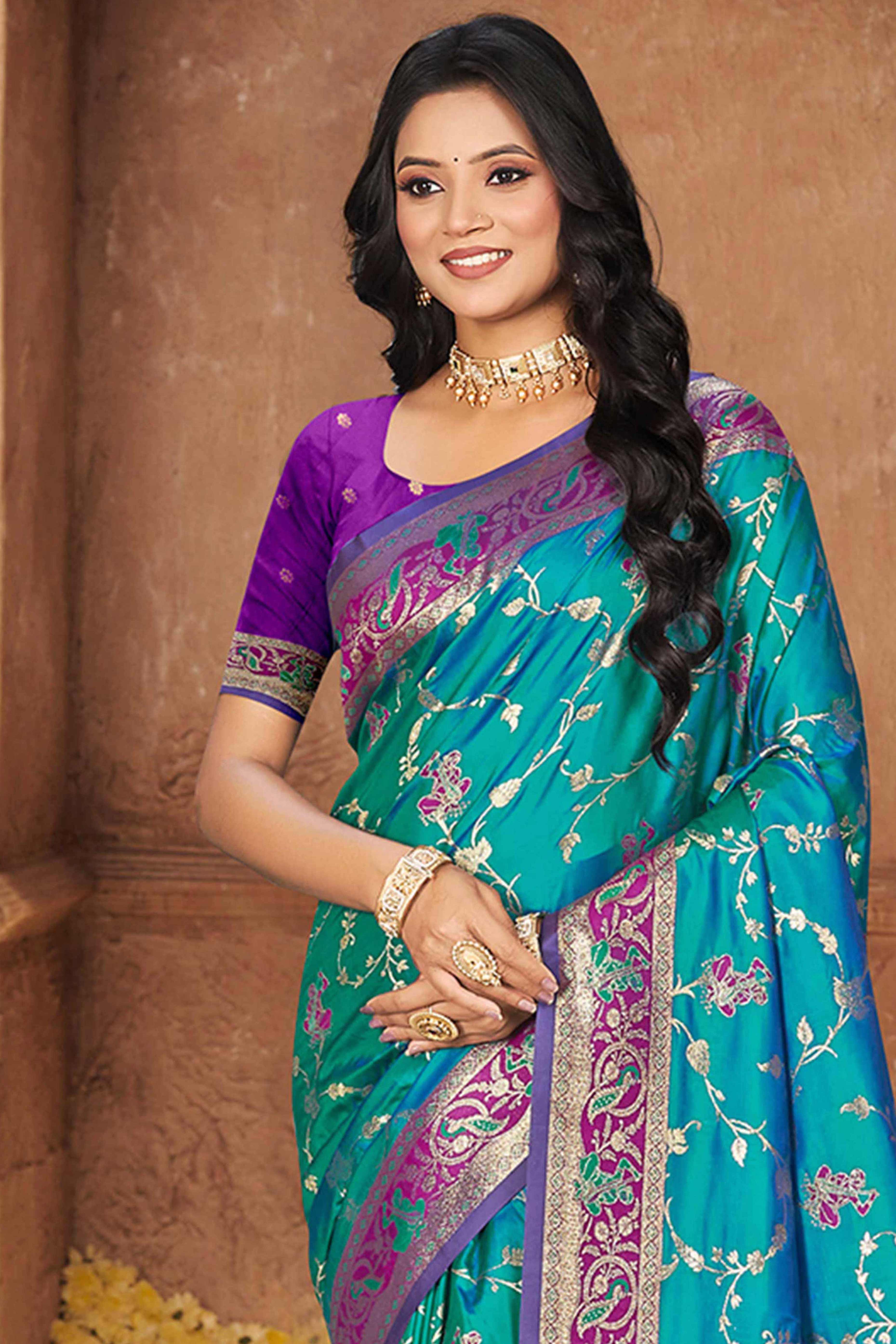 Radiant Rama Blue Floral Zari Weaving Silk Blend Saree With Tassel Pallu